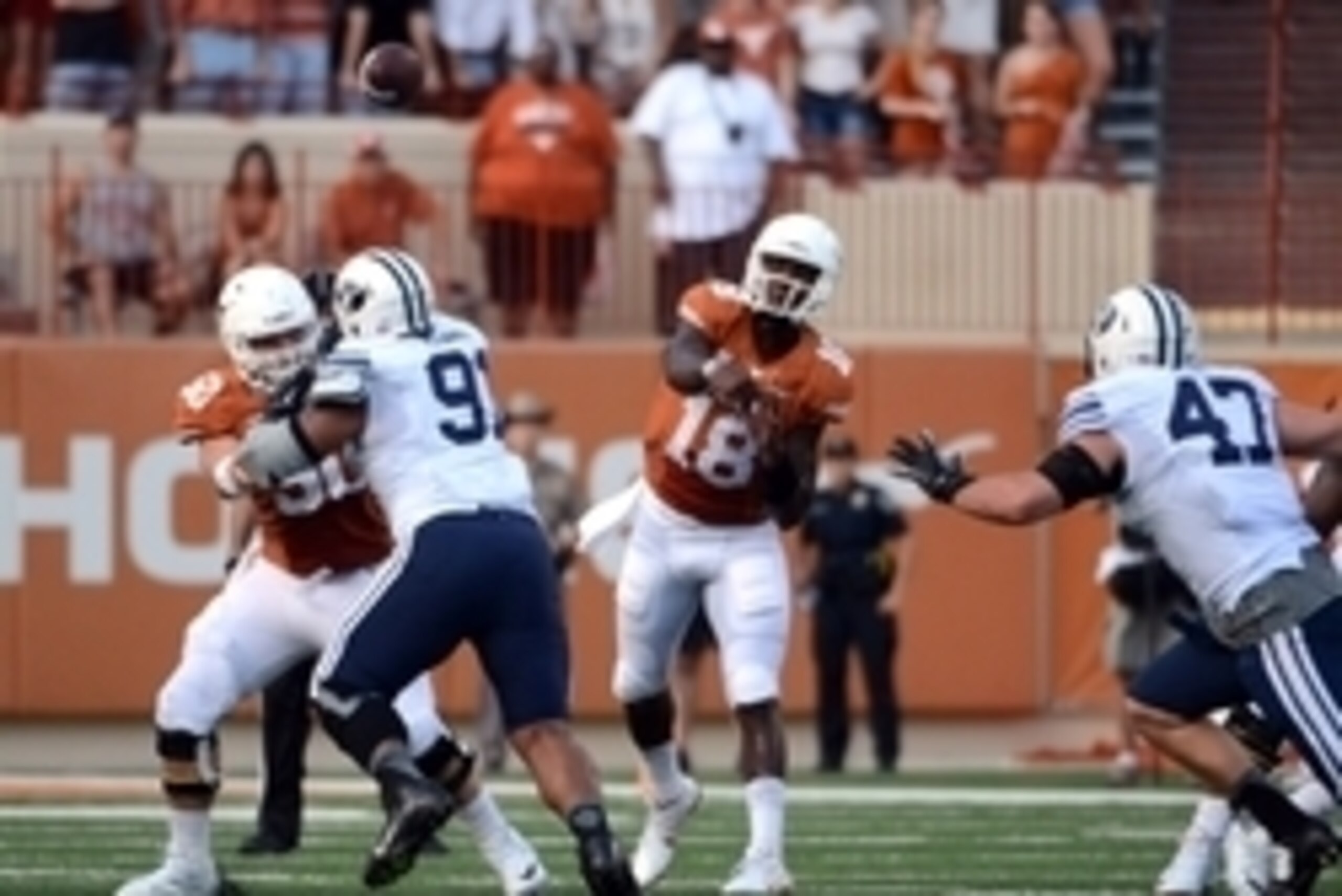 Sep 6, 2014; Austin, TX, USA; Texas Longhorns quarterback Tyrone Swoopes (18) passes the ball against the Brigham Young Cougars during the first half at Darrell K Royal-Texas Memorial Stadium. Mandatory Credit: Brendan Maloney-USA TODAY Sports
