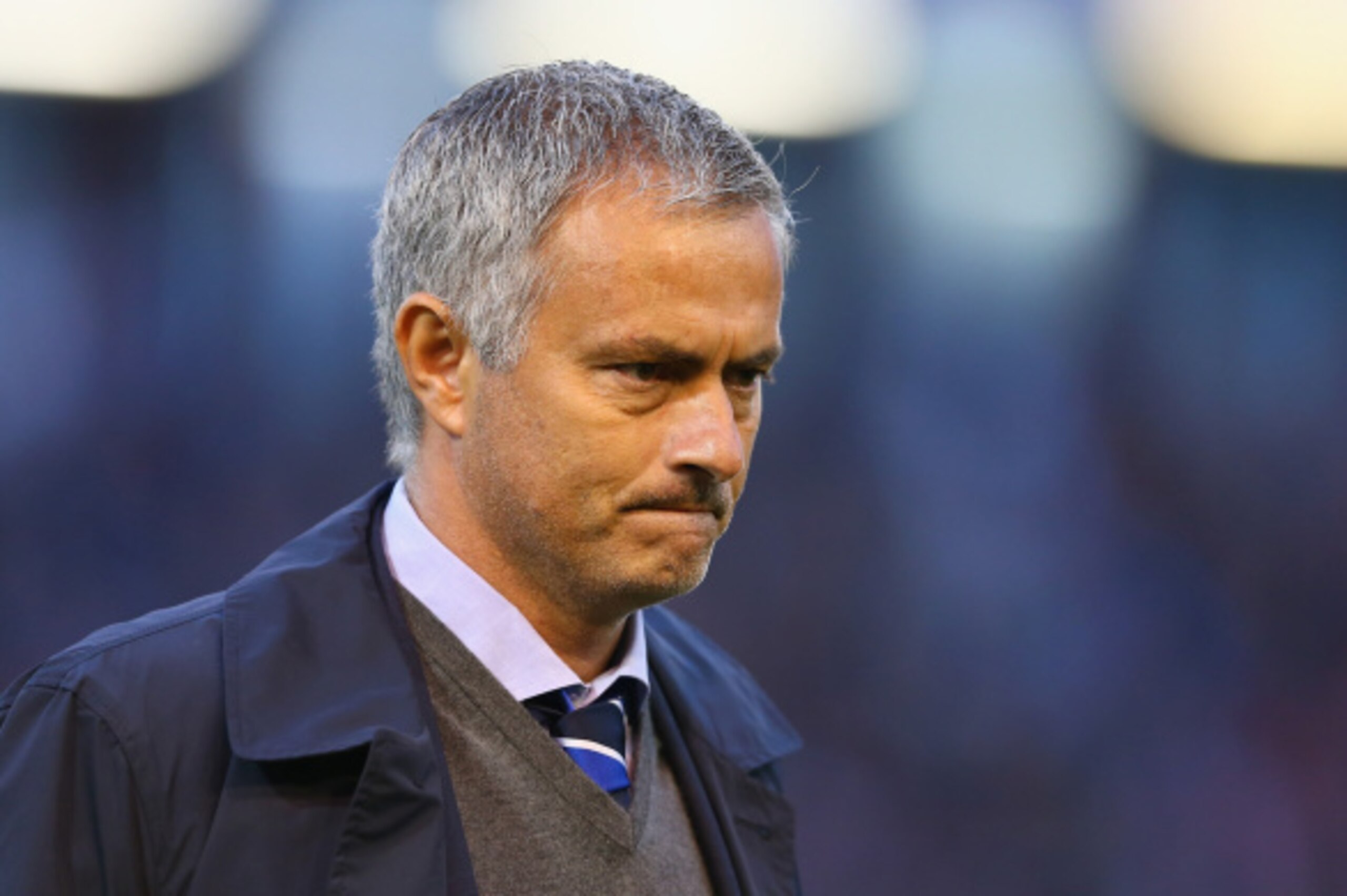 BURNLEY, ENGLAND - AUGUST 18:  Chelsea manager Jose Mourinho walks to the dug out prior to the Barclays Premier League match between Burnley and Chelsea at Turf Moor on August 18, 2014 in Burnley, England.  (Photo by Clive Brunskill/Getty Images)