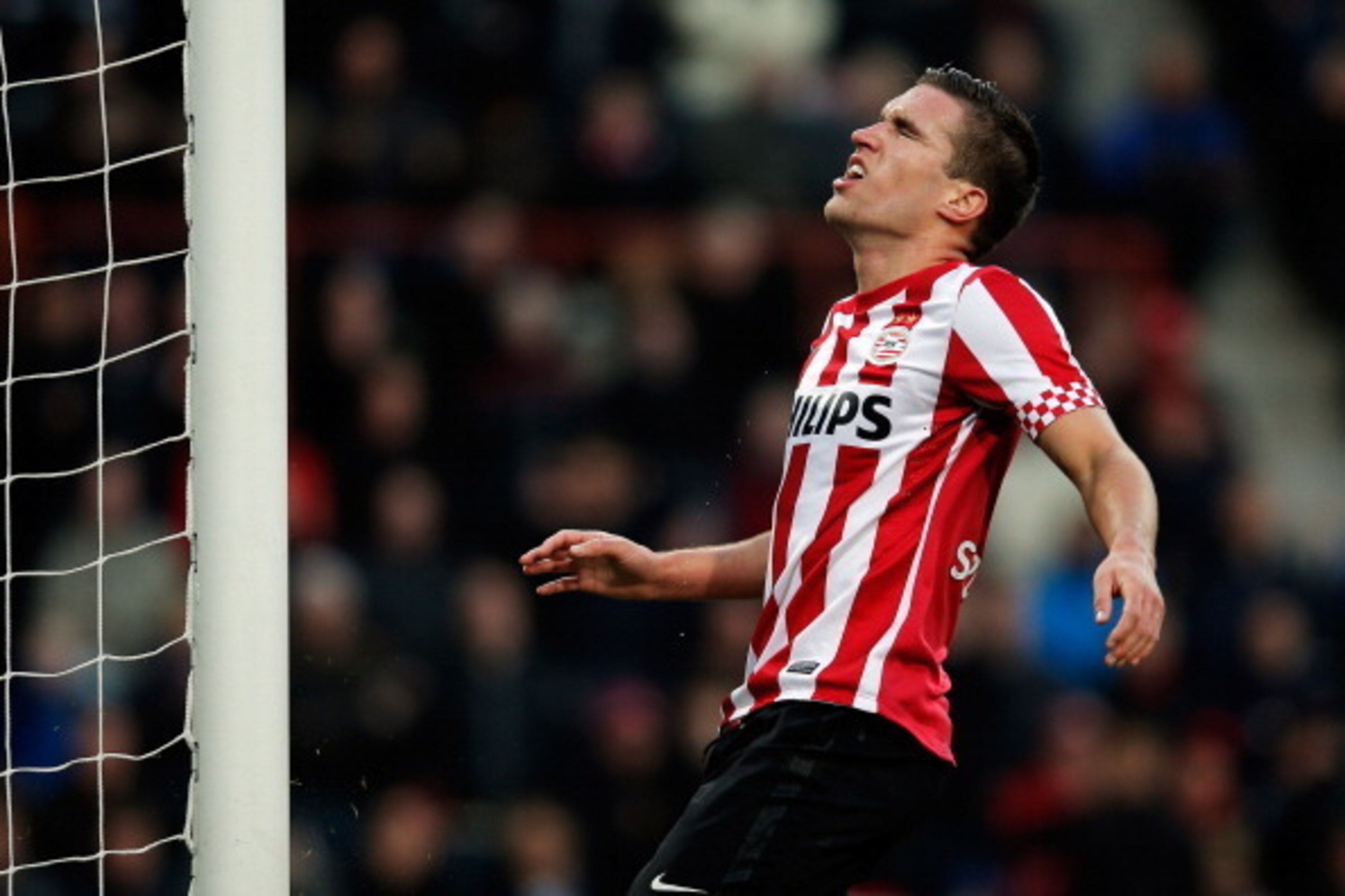 EINDHOVEN, NETHERLANDS - NOVEMBER 25:  Kevin Strootman of PSV reacts to a missed chance on goal during the Eredivisie match between PSV Eindhoven and Vitesse Arnhem at Philips Stadion on November 25, 2012 in Eindhoven, Netherlands.  (Photo by Dean Mouhtar