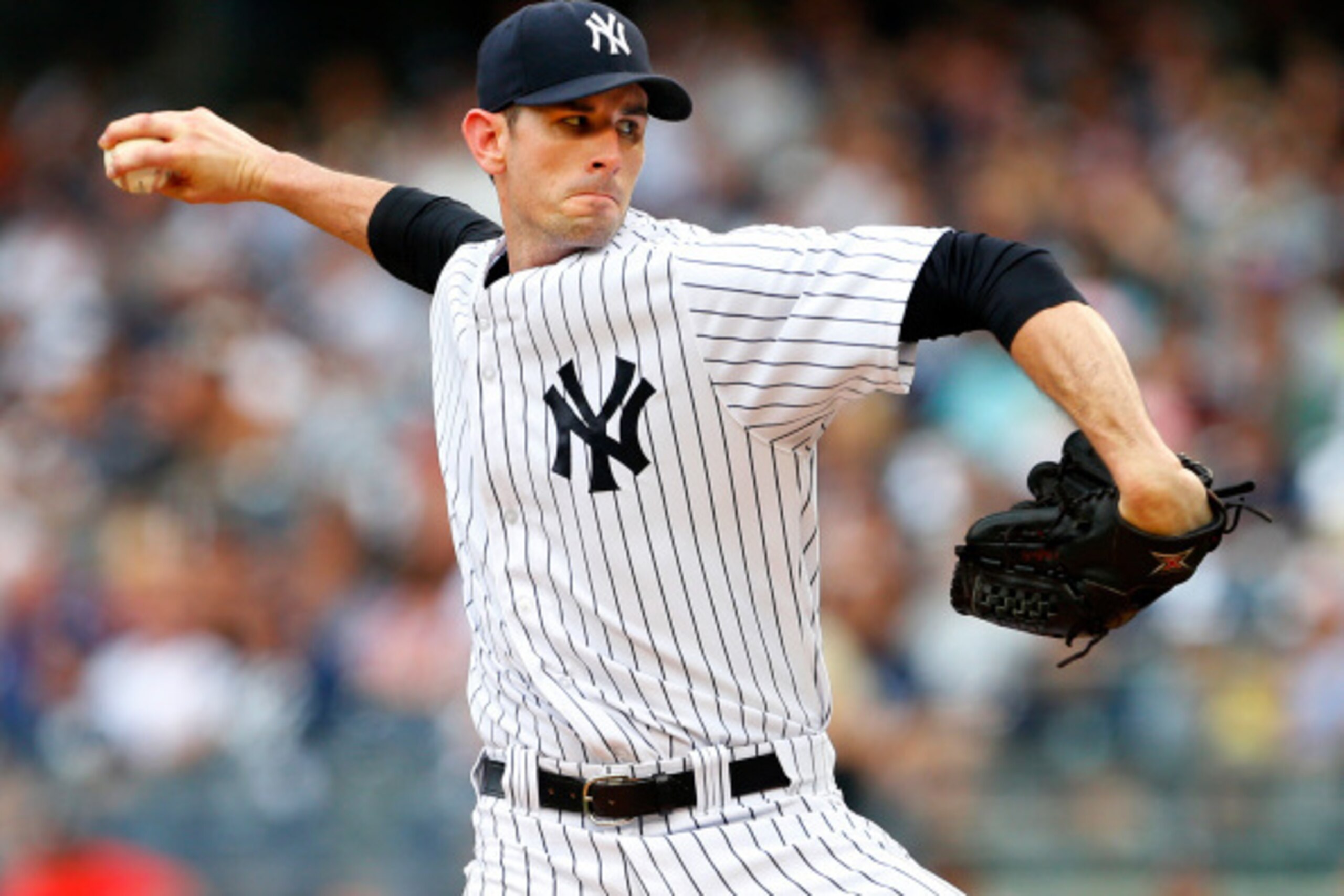NEW YORK, NY - SEPTEMBER 06: Brandon McCarthy #38 of the New York Yankees delivers a pitch against the Kansas City Royals during the first inning of a MLB baseball game at Yankee Stadium on September 6, 2014 in the Bronx borough of New York City. (Photo b
