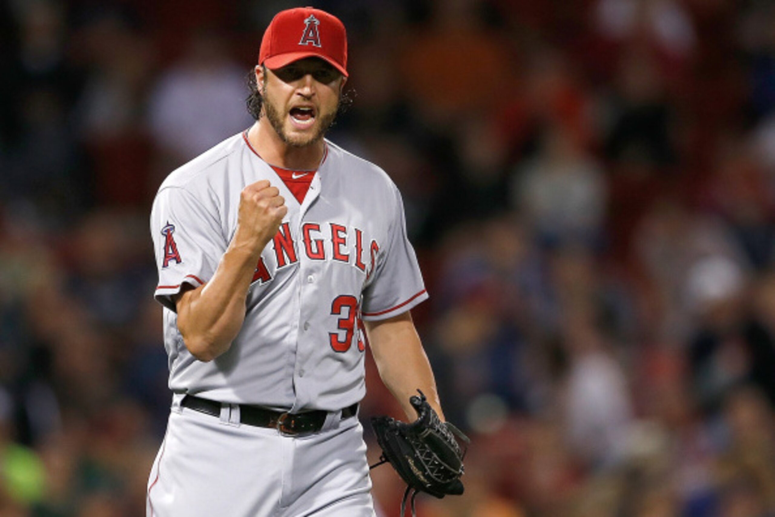 BOSTON, MA - AUGUST 21: Jason Grilli #39 of the Los Angeles Angels celebrates a 2-0 victory  against the Boston Red Sox in the first inning at Fenway Park on August 21, 2014 in Boston, Massachusetts.  (Photo by Jim Rogash/Getty Images)