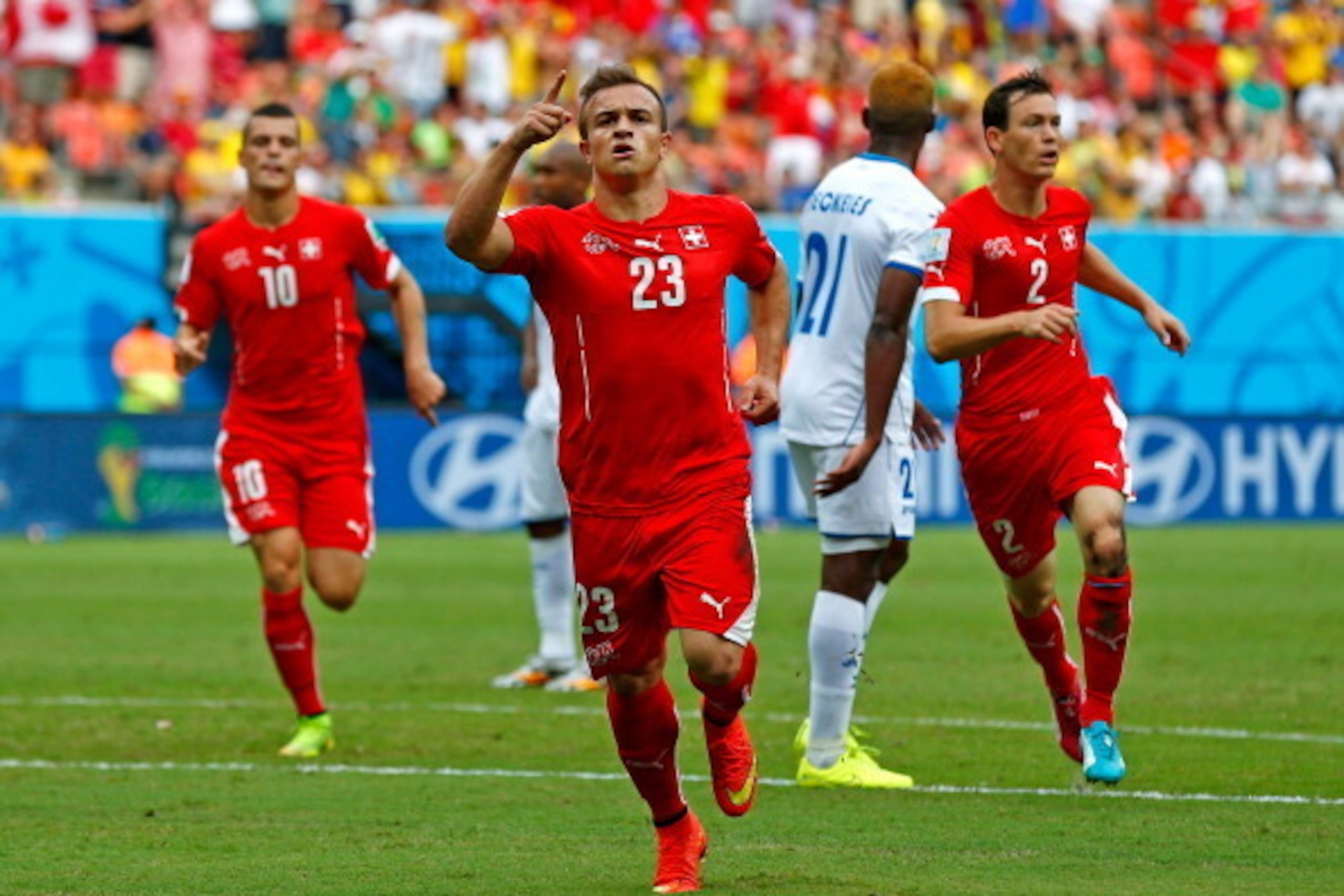 MANAUS, BRAZIL - JUNE 25:  Xherdan Shaqiri of Switzerland celebrates scoring his team's first goal during the 2014 FIFA World Cup Brazil Group E match between Honduras and Switzerland at Arena Amazonia on June 25, 2014 in Manaus, Brazil.  (Photo by Matthe