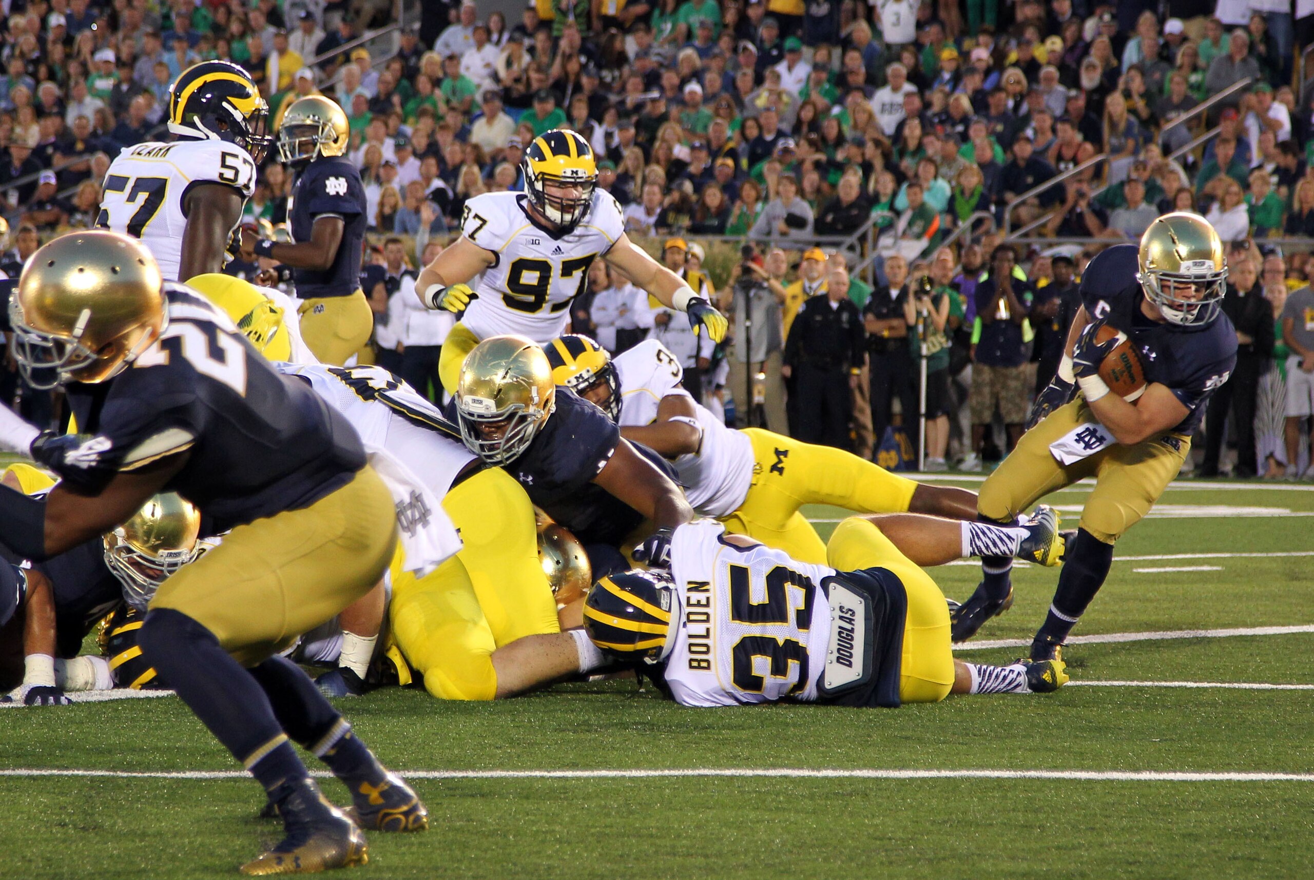 Sep 6, 2014; South Bend, IN, USA; Notre Dame Fighting Irish running back Cam McDaniel (33) scores a touchdown against the Michigan Wolverines at Notre Dame Stadium. Mandatory Credit: Brian Spurlock-USA TODAY Sports