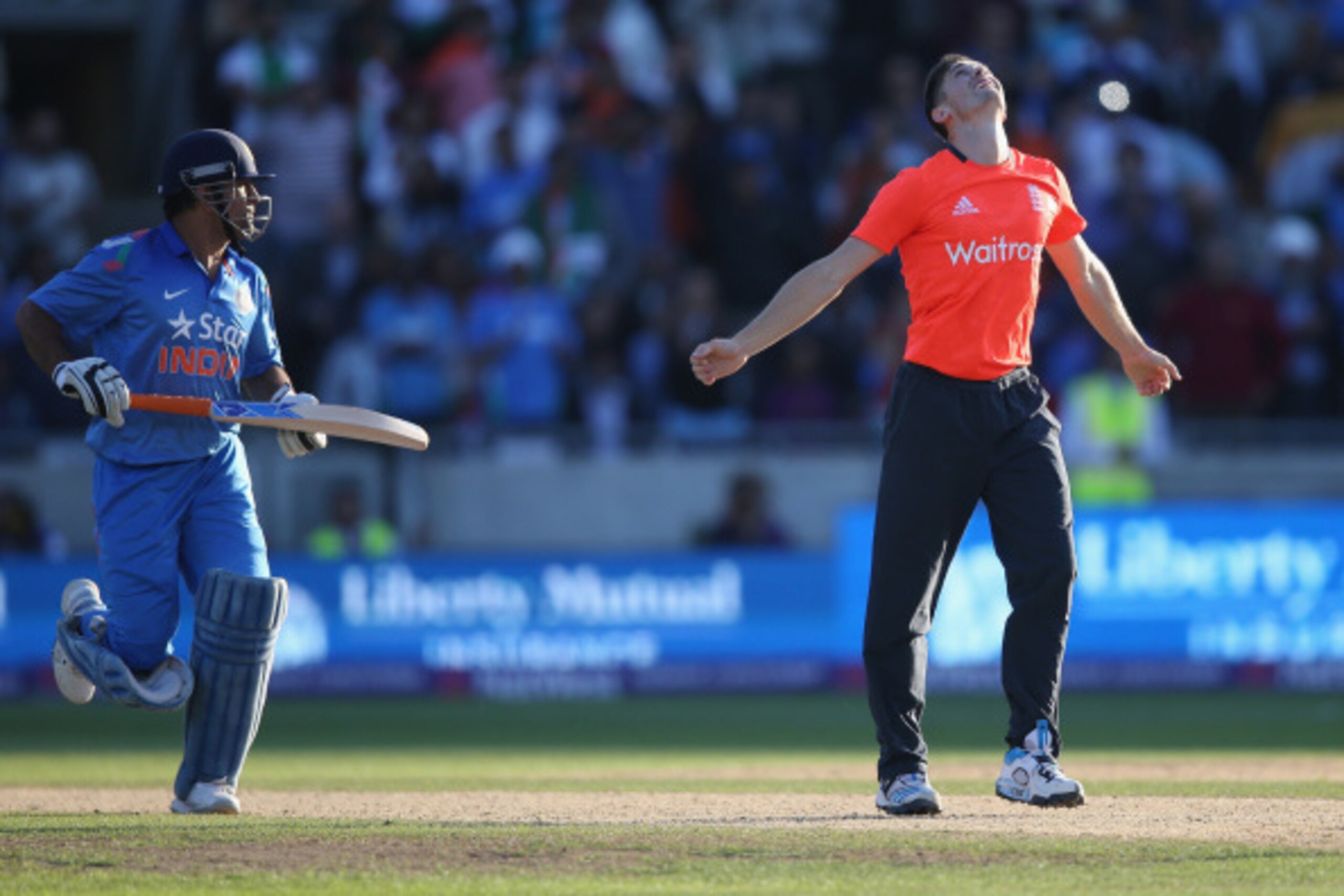 BIRMINGHAM, ENGLAND - SEPTEMBER 07:  Chris Woakes of England celebrates victory afer he bowled the last ball of the match to MS Dohni of India during the NatWest International T20 2014 match between England and India at Edgbaston on September 7, 2014 in B