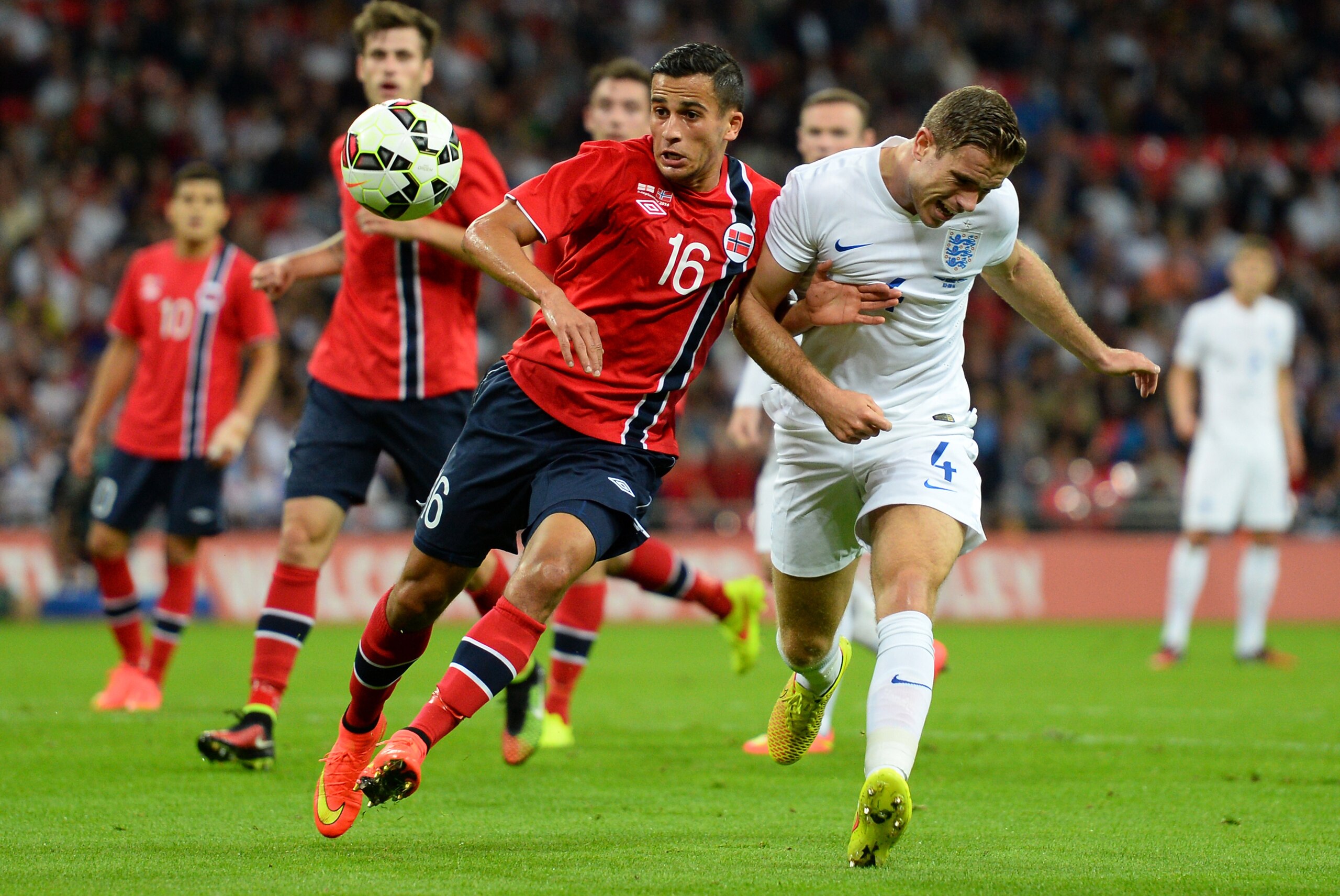 LONDON, ENGLAND - SEPTEMBER 03:  Jordan Henderson of England (R) is challenged by Omar Elabdellaoui of Norway during the International friendly match between England and Norway at Wembley Stadium on September 3, 2014 in London, England.  (Photo by Jamie M