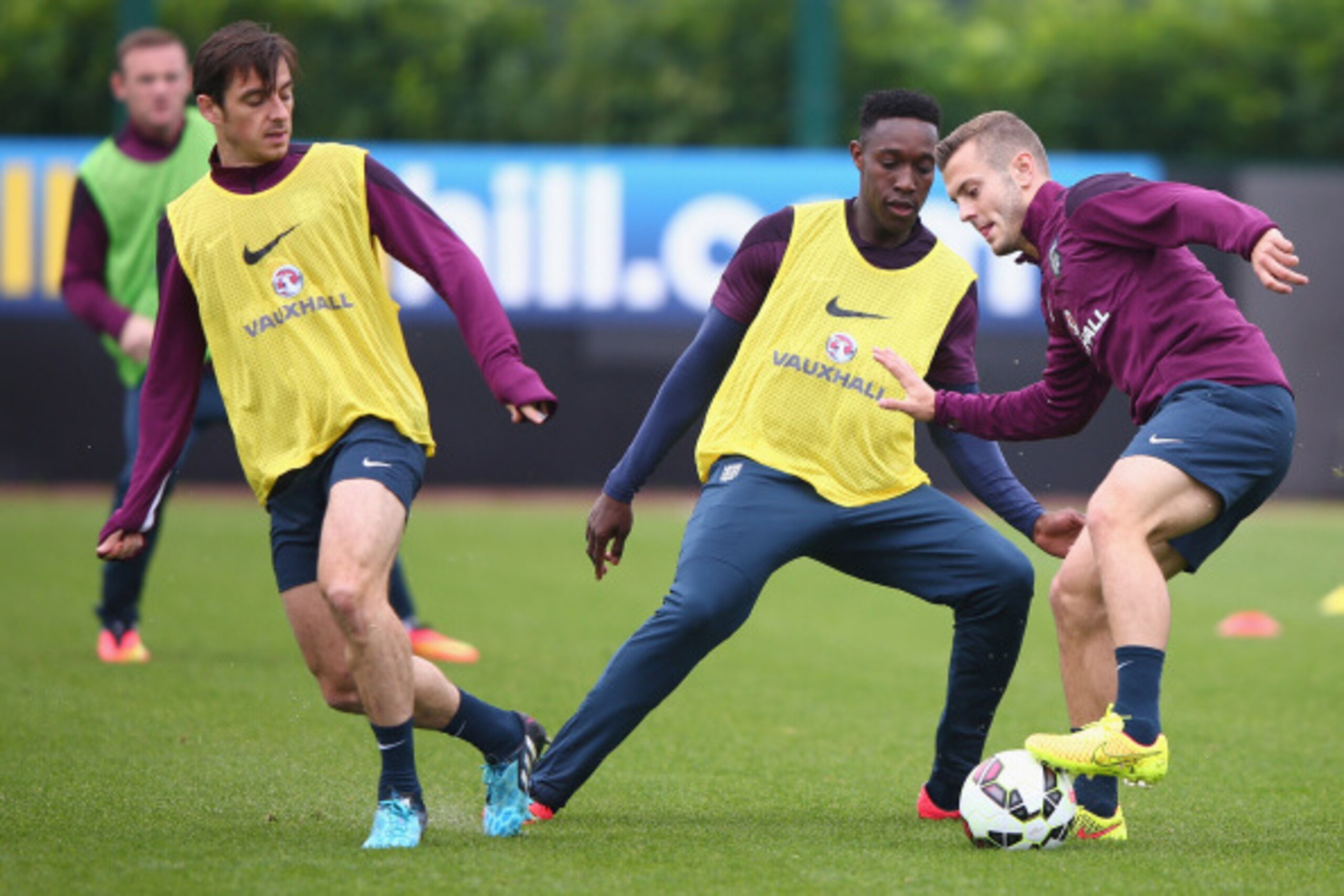 LONDON, ENGLAND - SEPTEMBER 01:  Danny Welbeck tries to tackles Jack Wilshere during an England training session before the international friendly match against Norway at London Colney  on September 1, 2014 in London, England.  (Photo by Ian Walton/Getty 