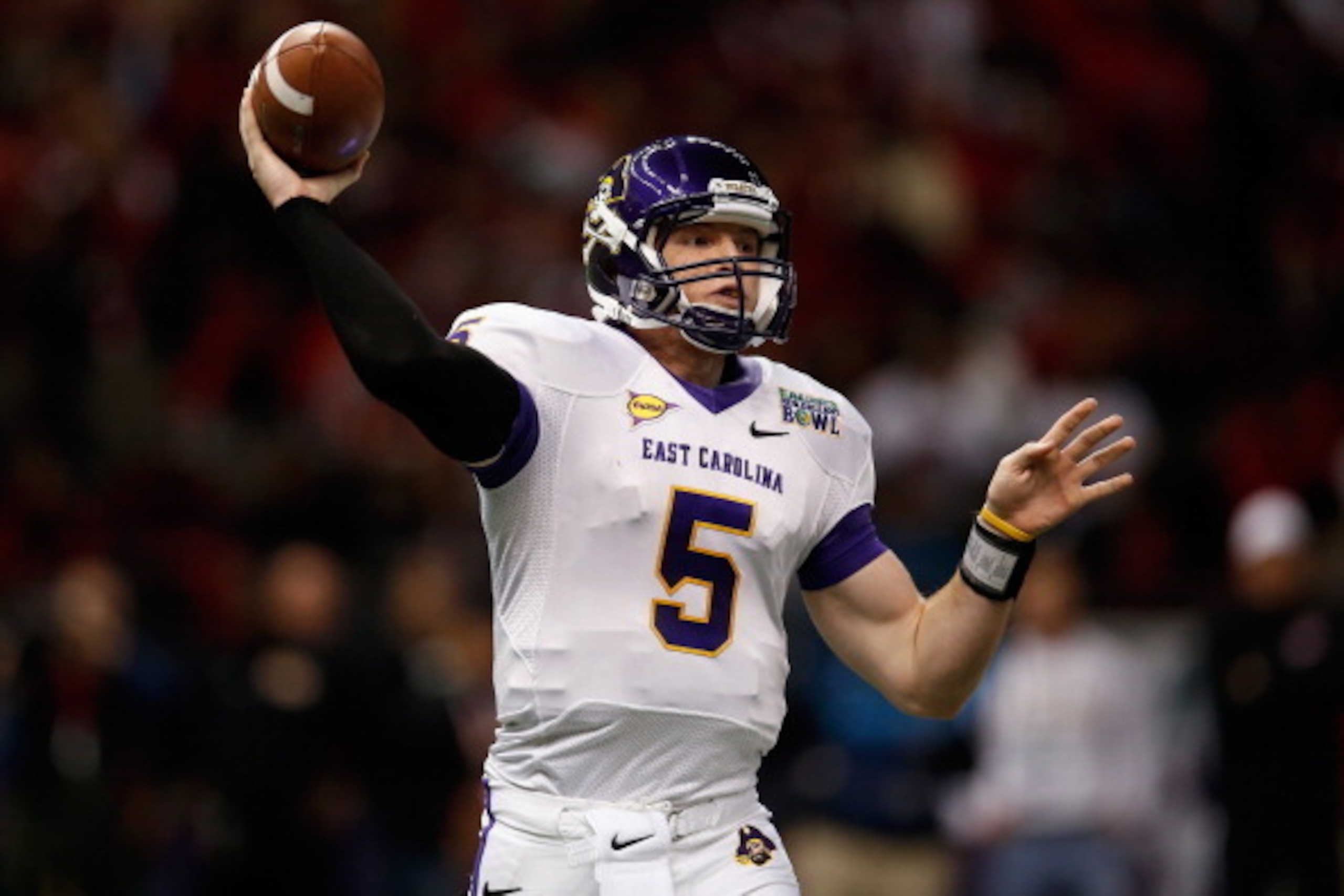 NEW ORLEANS, LA - DECEMBER 22:  Shane Carden #5 of the East Carolina Pirates looks to throw a pass against the Louisiana-Lafayette Ragin Cajuns during the R+L Carriers New Orleans Bowl at the Mercedes-Benz Superdome on December 22, 2012 in New Orleans, Lo
