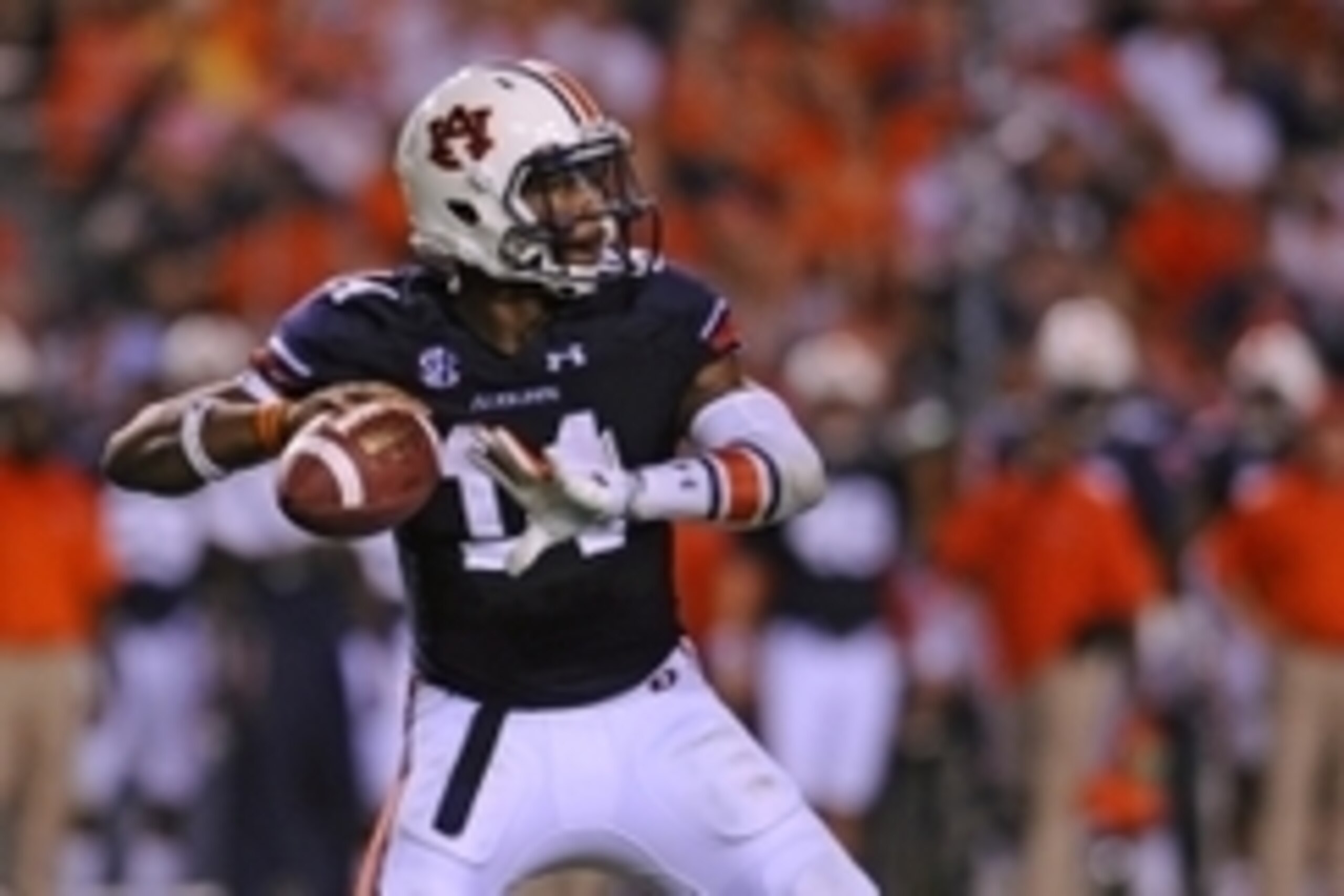 Sep 6, 2014; Auburn, AL, USA; Auburn Tigers quarterback Nick Marshall (14) looks to pass during the second half against the San Jose State Spartans at Jordan Hare Stadium. The Tigers defeated the Spartans 59-13. Mandatory Credit: Shanna Lockwood-USA TODAY