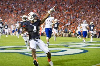 AUBURN, AL - SEPTEMBER 6: Wide receiver Quan Bray #4 of the Auburn Tigers points to the crowd after scoring a touchdown during their game against the San Jose State Spartans on September 6, 2014 at Jordan-Hare Stadium in Auburn, Alabama. At halftime Aubur