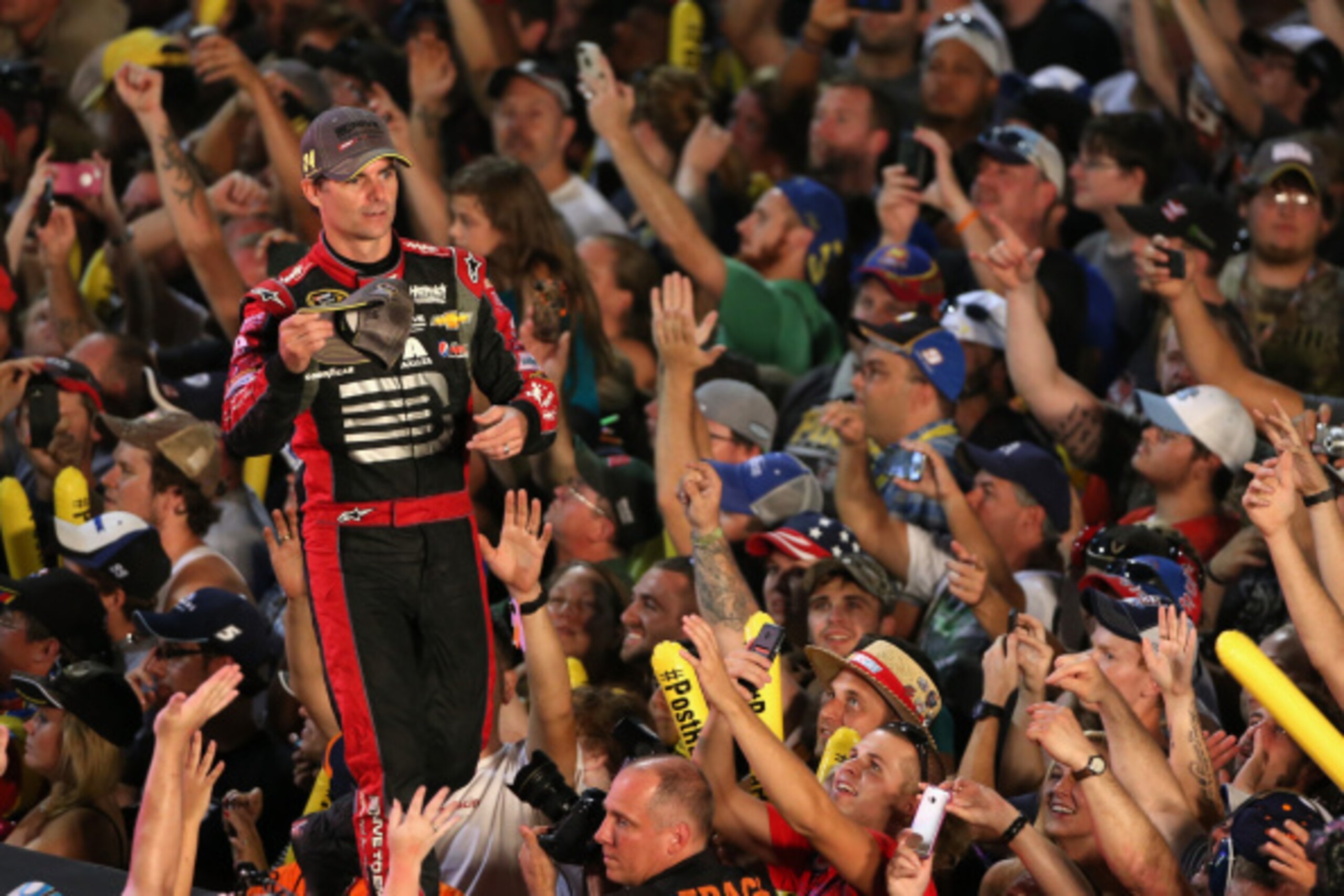 RICHMOND, VA - SEPTEMBER 06:  Jeff Gordon, driver of the #24 Drive to End Hunger Chevrolet, celebrates after qualifying for the Chase For The Sprint Cup following the NASCAR Sprint Cup Series Federated Auto Parts 400 at Richmond International Raceway on S