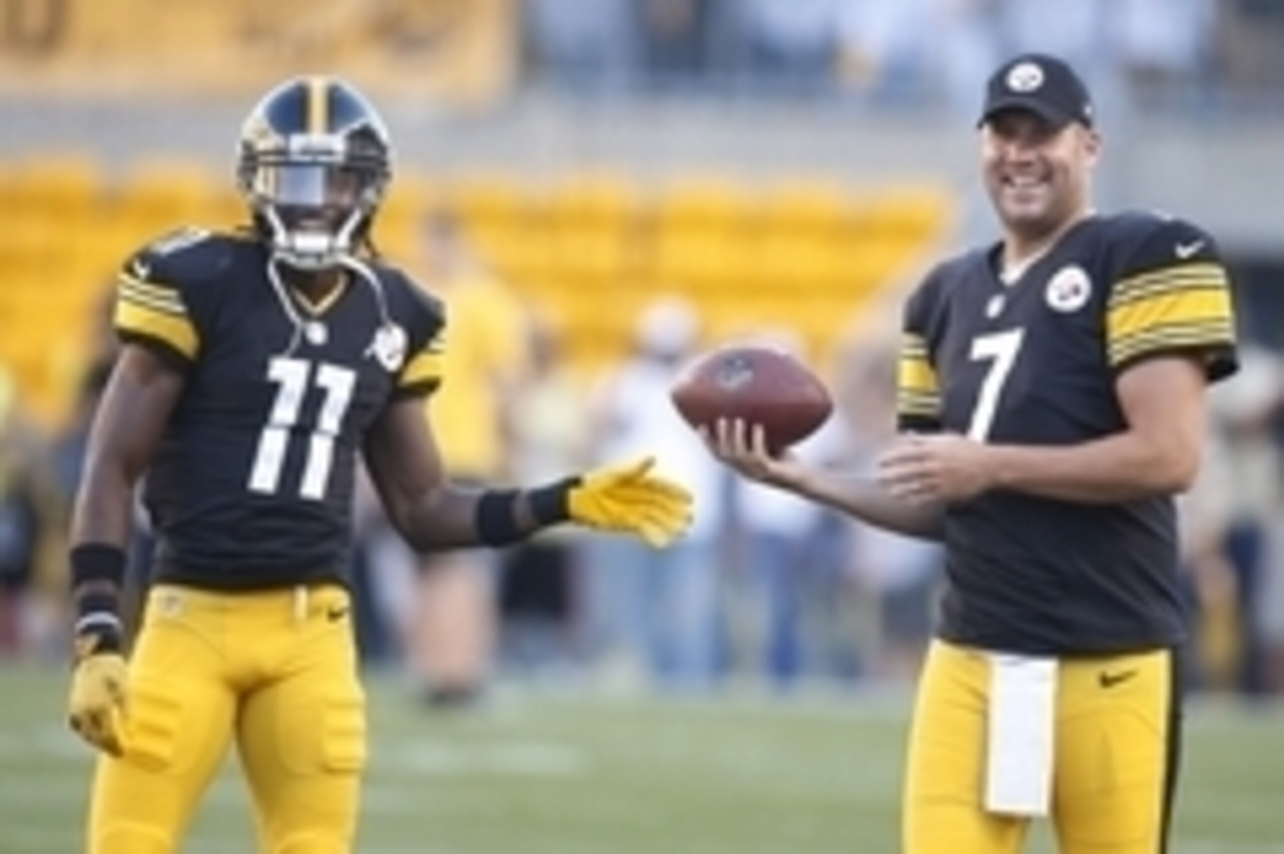 Aug 28, 2014; Pittsburgh, PA, USA; Pittsburgh Steelers wide receiver Markus Wheaton (11) and quarterback Ben Roethlisberger (7) smile on the field before playing the Carolina Panthers at Heinz Field. Mandatory Credit: Charles LeClaire-USA TODAY Sports