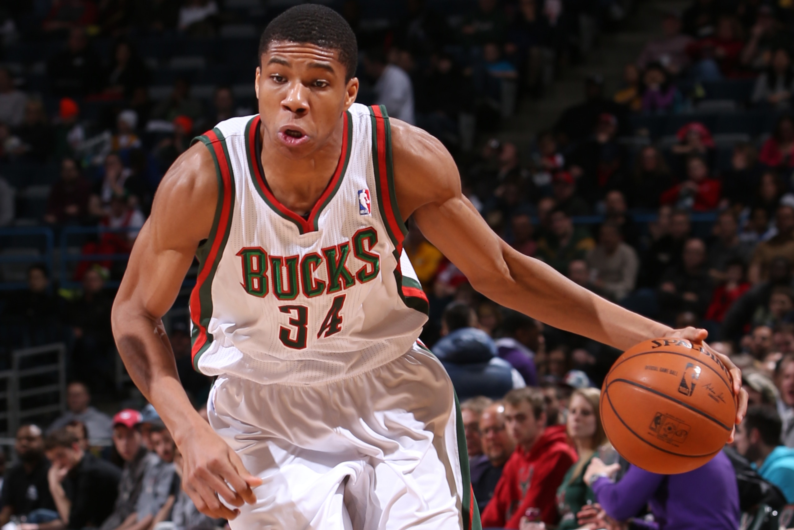 MILWAUKEE, WI - MARCH 8: Giannis Antetokounmpo #34 of the Milwaukee Bucks drives to the basket against the Washington Wizards on March 8, 2014 at the BMO Harris Bradley Center in Milwaukee, Wisconsin. NOTE TO USER:  User expressly acknowledges and agrees