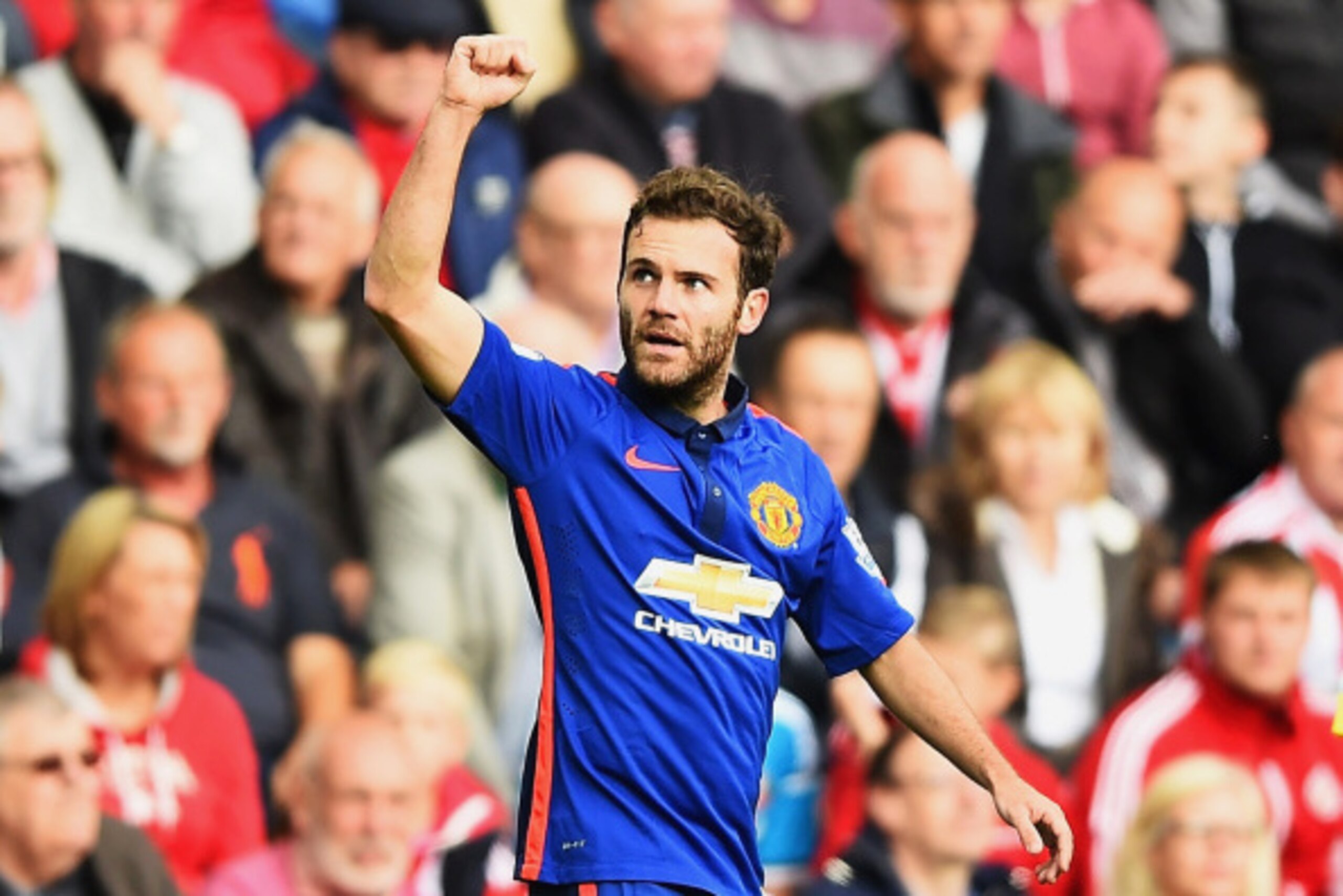 SUNDERLAND, ENGLAND - AUGUST 24: Juan Mata of Manchester United celebrates scoring the opening goal during the Barclays Premier League match between Sunderland and Manchester United at Stadium of Light on August 24, 2014 in Sunderland, England. (Photo by SUNDERLAND, ENGLAND - AUGUST 24: Juan Mata of Manchester United celebrates scoring the opening goal during the Barclays Premier League match between Sunderland and Manchester United at Stadium of Light on August 24, 2014 in Sunderland, England. (Photo by