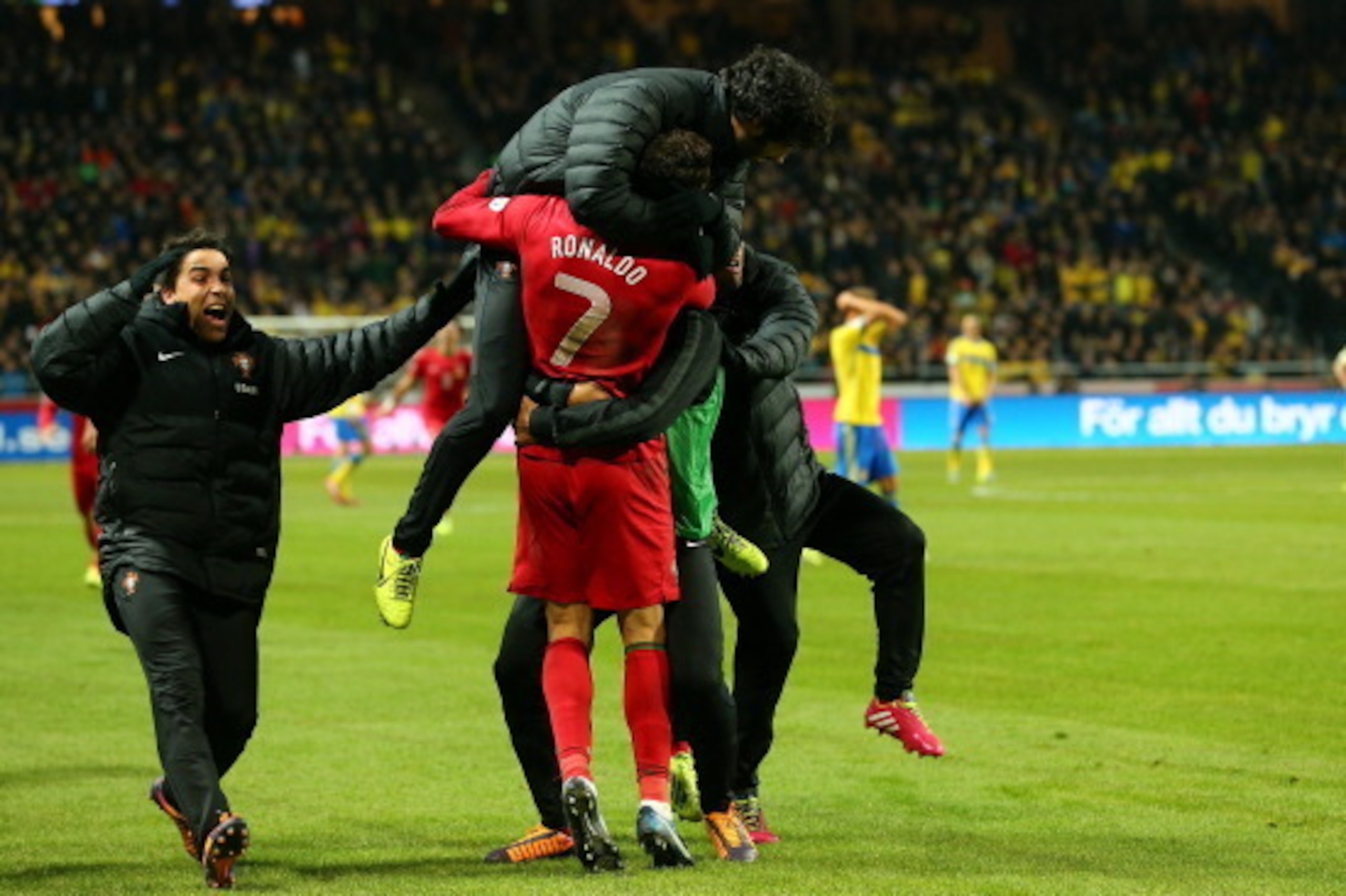 STOCKHOLM, SWEDEN - NOVEMBER 19: Cristiano Ronaldo (C) of Portugal celebrate with his team mates after winning the FIFA 2014 World Cup Qualifier Play-off Second Leg match between Sweden and Portugal at Friends Arena on November 19, 2013 in Stockholm, Swe STOCKHOLM, SWEDEN - NOVEMBER 19: Cristiano Ronaldo (C) of Portugal celebrate with his team mates after winning the FIFA 2014 World Cup Qualifier Play-off Second Leg match between Sweden and Portugal at Friends Arena on November 19, 2013 in Stockholm, Swe