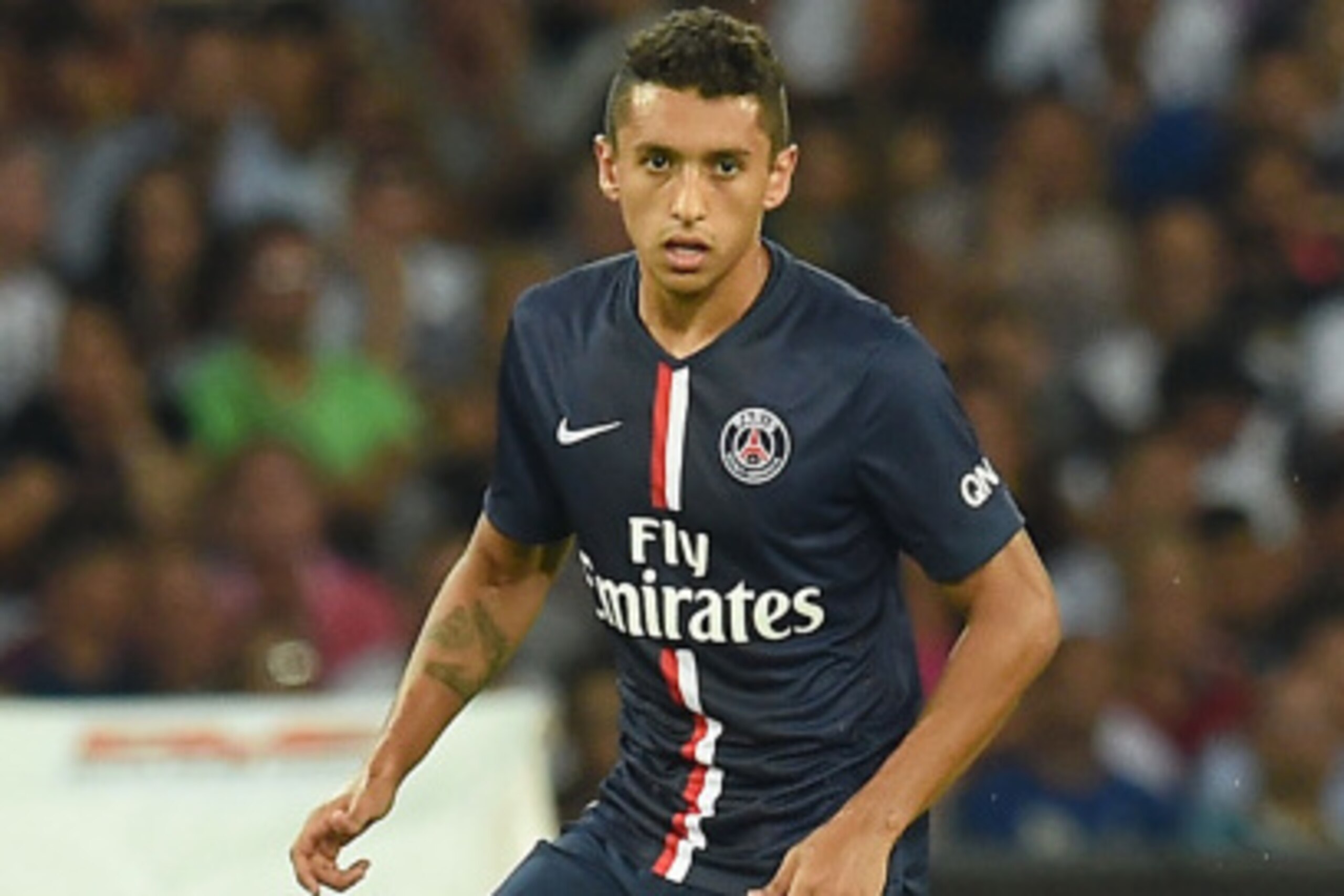 NAPLES, ITALY - AUGUST 11:  Marquinhos of Paris Saint Germain  in action during the pre-season friendly match between SSC Napoli and Paris Saint-Germain FC at Stadio San Paolo on August 11, 2014 in Naples, Italy.  (Photo by Giuseppe Bellini/Getty Images)
