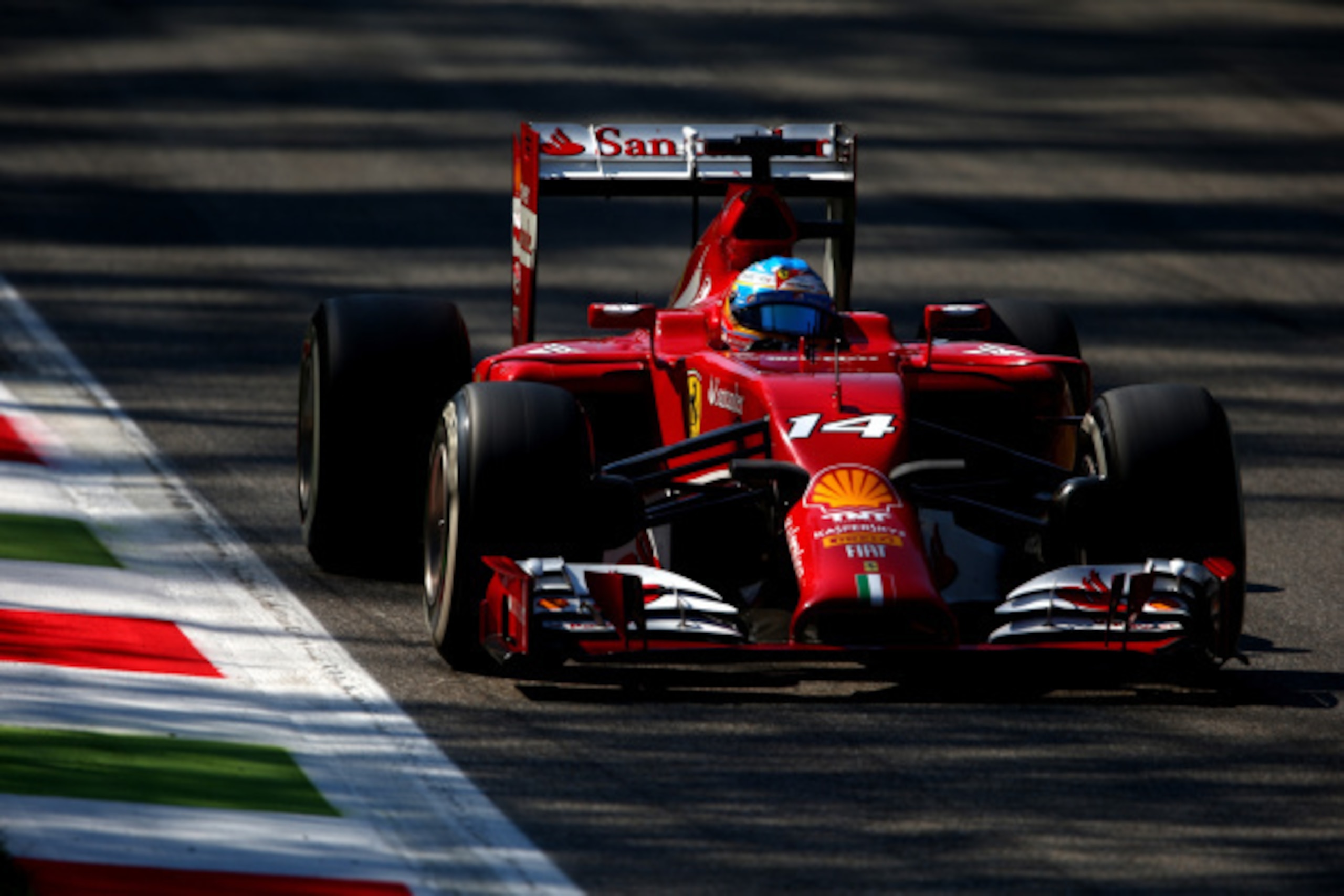 MONZA, ITALY - SEPTEMBER 06:  Fernando Alonso of Spain and Ferrari drives during Qualifying ahead of the F1 Grand Prix of Italy at Autodromo di Monza on September 6, 2014 in Monza, Italy.  (Photo by Paul Gilham/Getty Images)