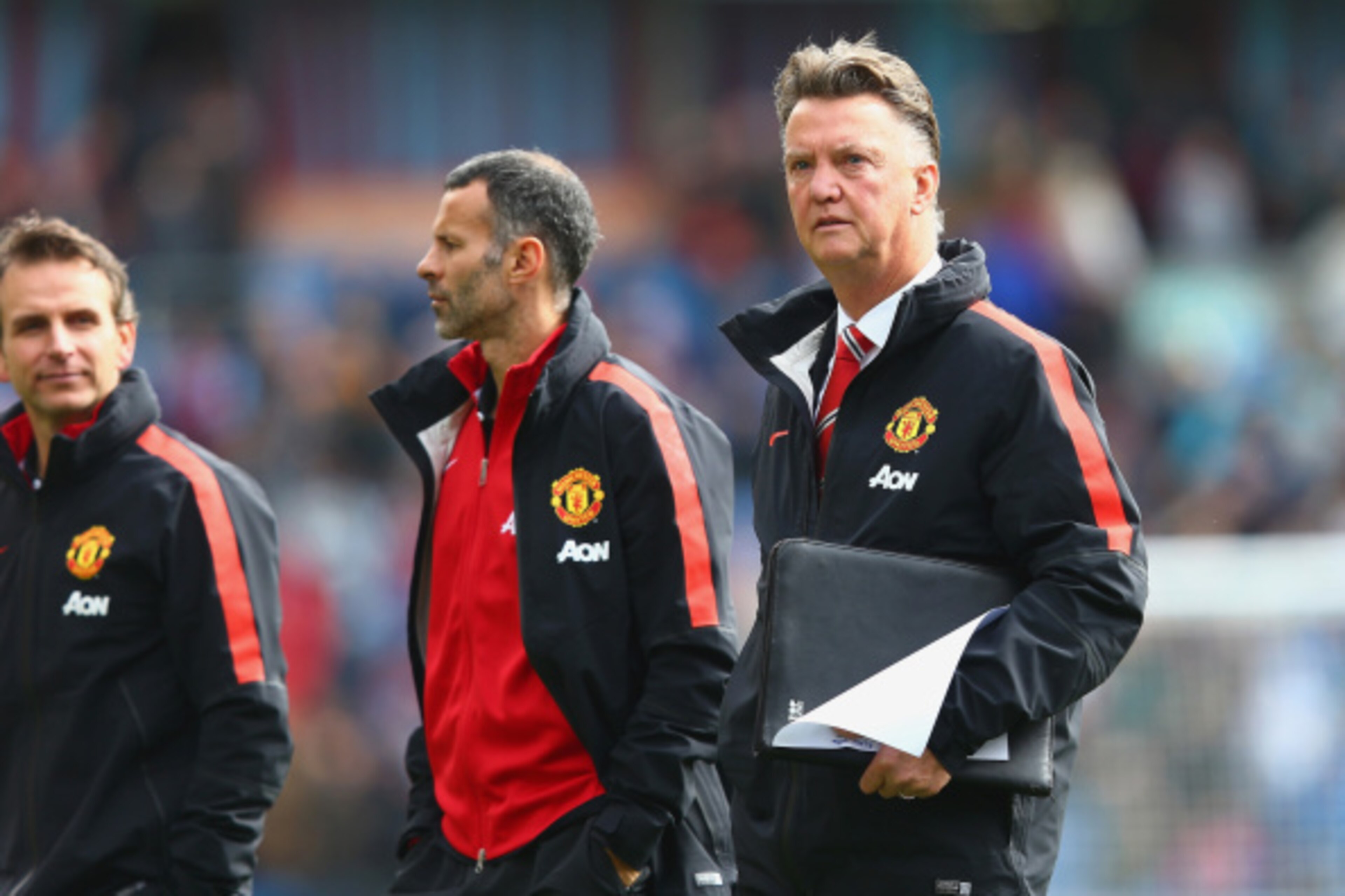 BURNLEY, ENGLAND - AUGUST 30:  Assistant Ryan Giggs of Manchester United and Manager Louis van Gaal of Manchester United look on during the Barclays Premier League match between Burnley and Manchester United at Turf Moor on August 30, 2014 in Burnley, Eng
