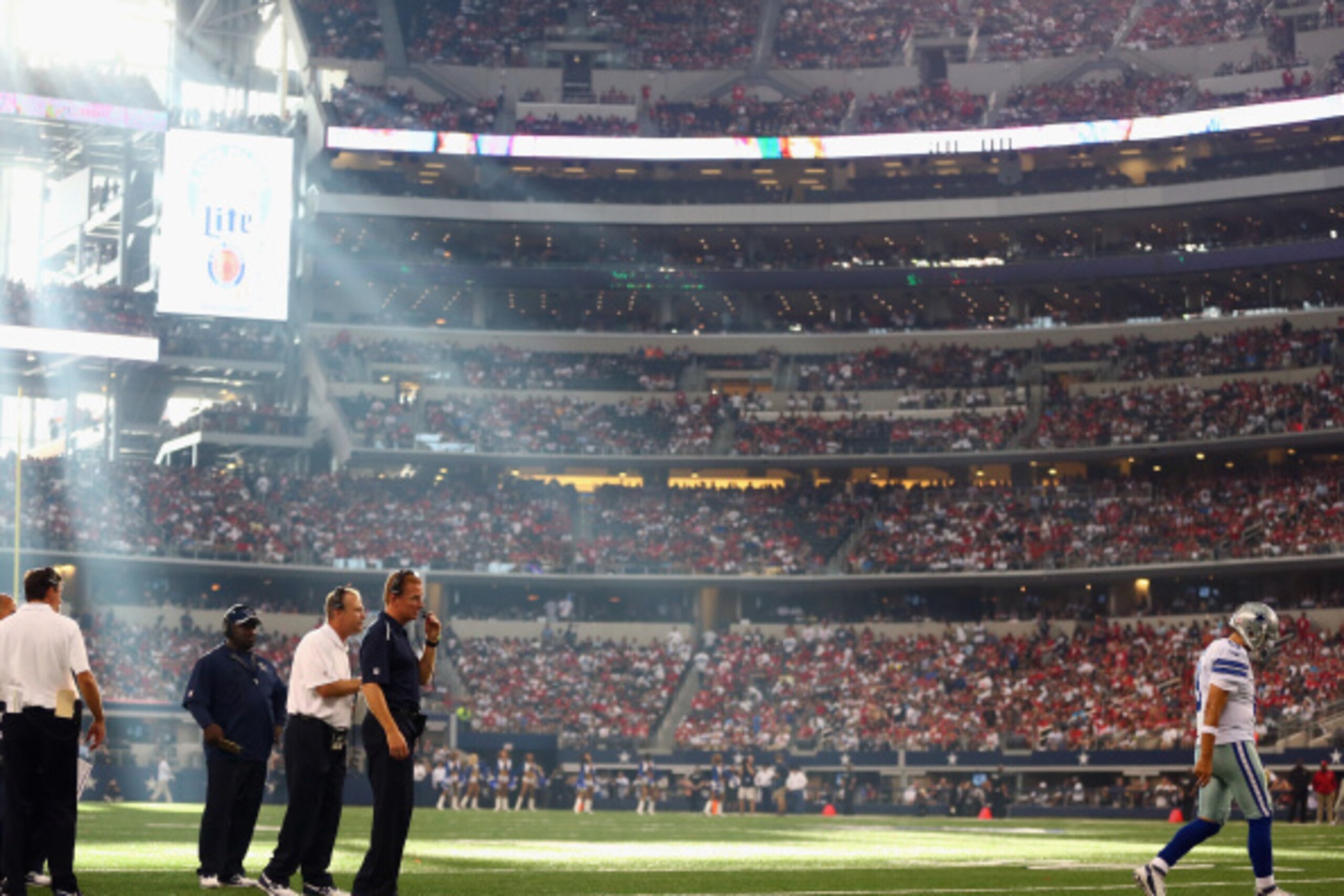 ARLINGTON, TX - SEPTEMBER 07:   Tony Romo #9 of the Dallas Cowboys walks back on the field during play against the San Francisco 49ers in the fourth quarter at AT&T Stadium on September 7, 2014 in Arlington, Texas.  (Photo by Ronald Martinez/Getty Images)