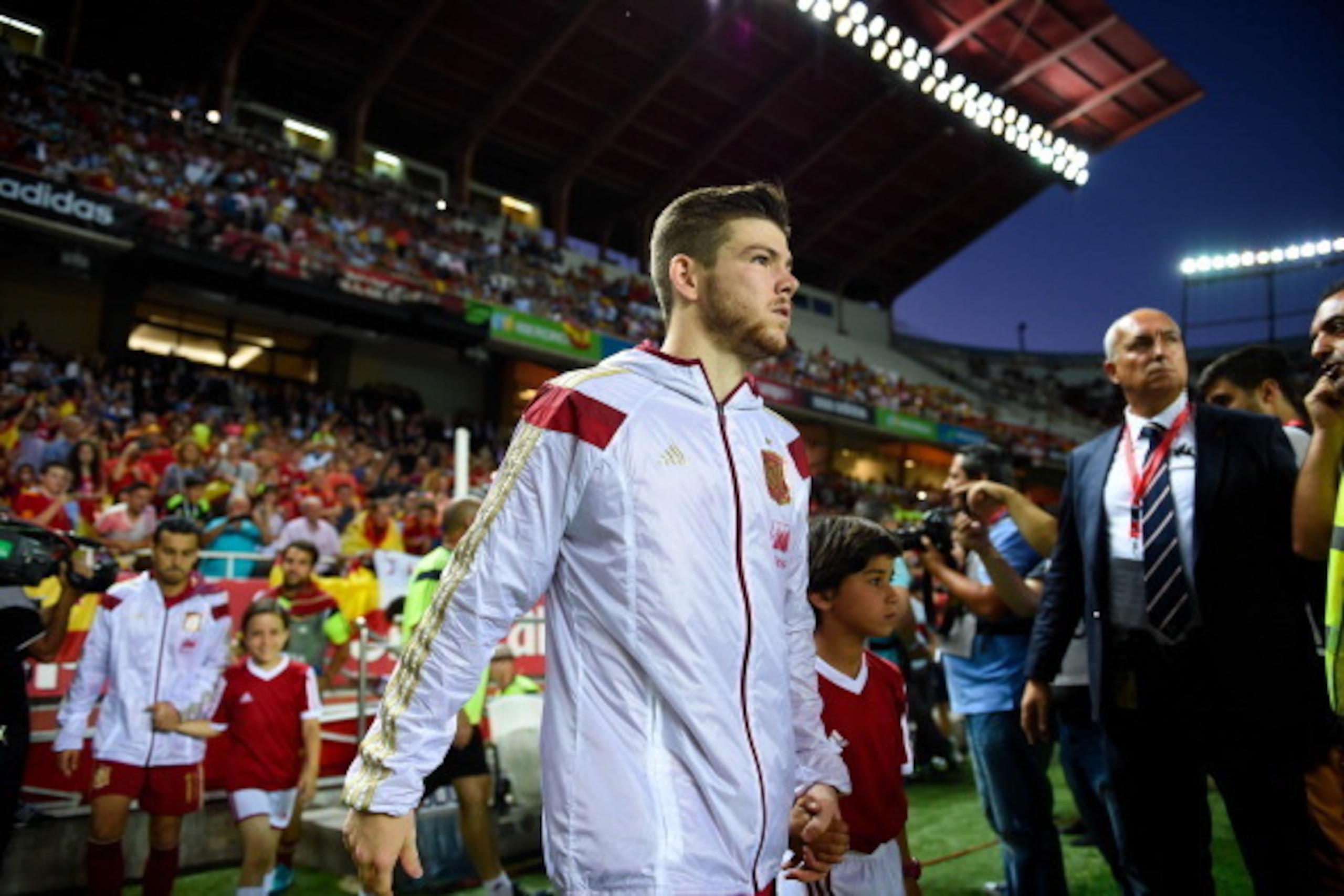 SEVILLE, SPAIN - MAY 30:  Alberto Moreno of Spain walks onto the pitch prior to an international friendly match between Spain and Bolivia at Estadio Ramon Sanchez Pizjuan on May 30, 2014 in Seville, Spain.  (Photo by David Ramos/Getty Images)