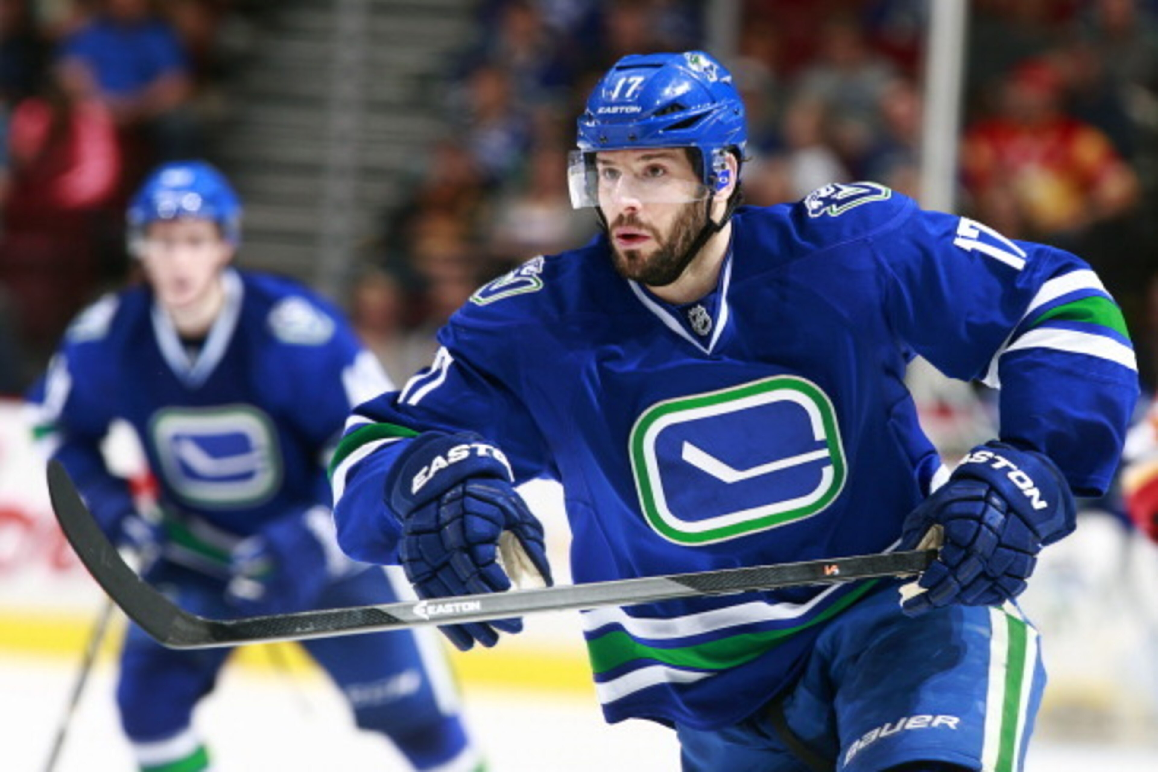 VANCOUVER, BC - APRIL 13:  Ryan Kesler #17 of the Vancouver Canucks skates up ice during their NHL game against the Calgary Flames at Rogers Arena April 13, 2014 in Vancouver, British Columbia, Canada.  Vancouver won 5-1. (Photo by Jeff Vinnick/NHLI via G