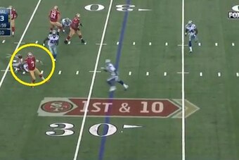Kaepernick is nearly sacked but eludes the tackle and keeps the play alive.