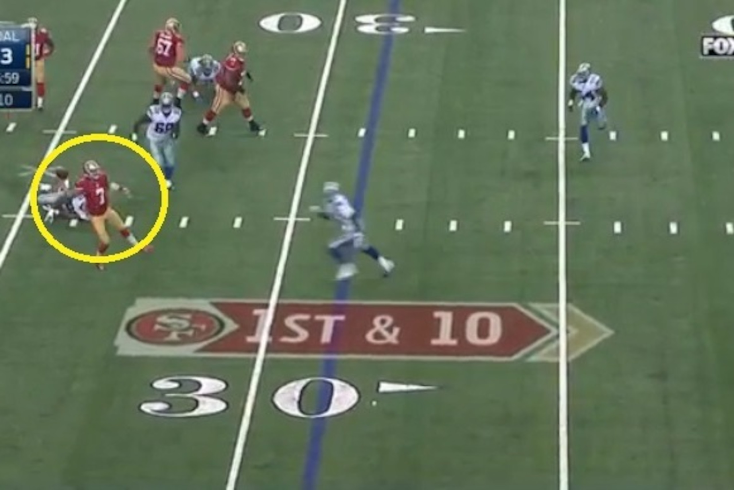 Kaepernick is nearly sacked but eludes the tackle and keeps the play alive.