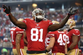 ARLINGTON, TX - SEPTEMBER 07:  Anquan Boldin #81 of the San Francisco 49ers celebrates after the San Francisco 49ers scored against the Dallas Cowboys in the first half at AT&T Stadium on September 7, 2014 in Arlington, Texas.  (Photo by Christian Peterse