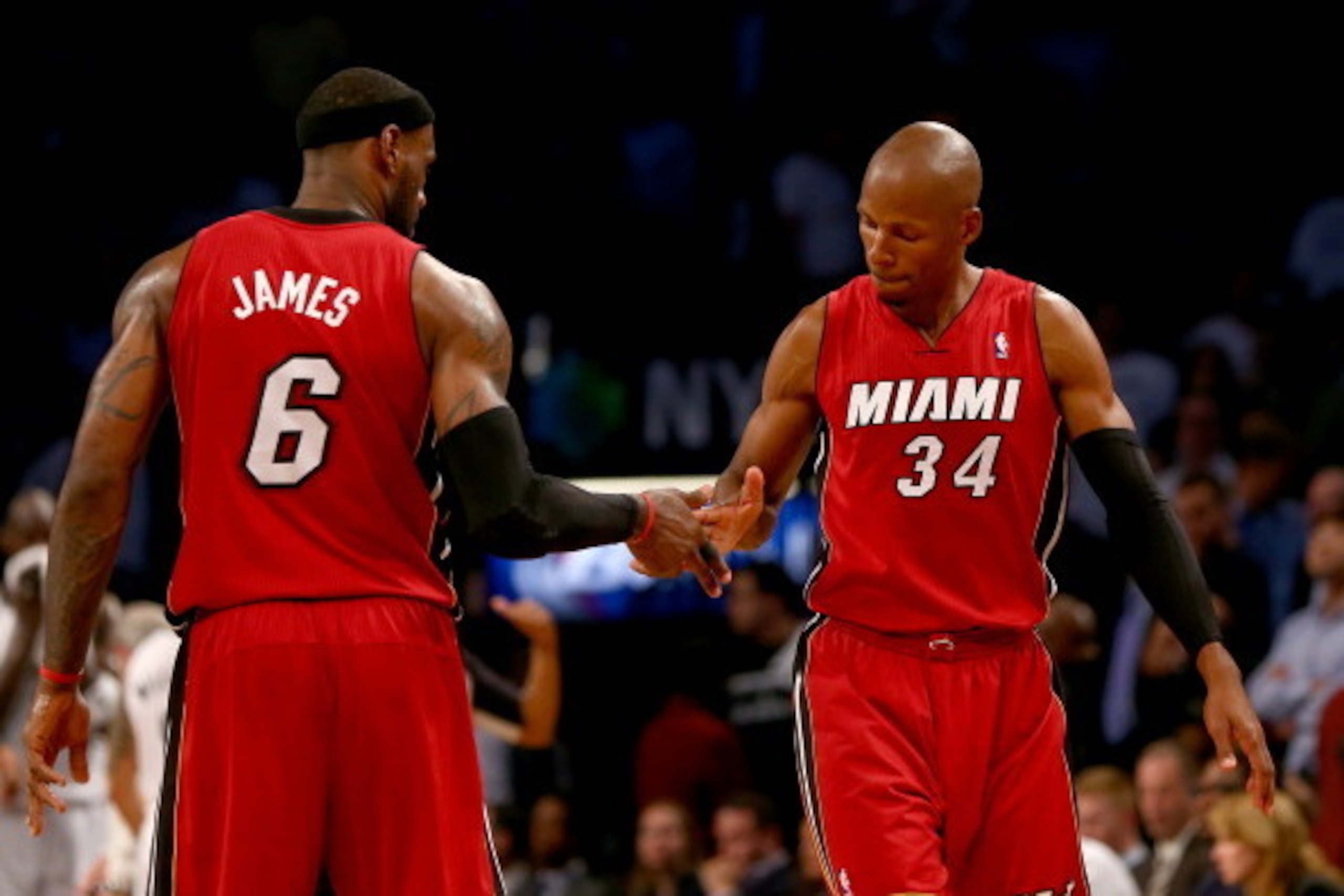 NEW YORK, NY - MAY 12:  LeBron James #6 and Ray Allen #34 of the Miami Heat celebrate in the final minutes of the game against the Brooklyn Nets in Game Four of the Eastern Conference Semifinals during the 2014 NBA Playoffs at the Barclays Center on May 1