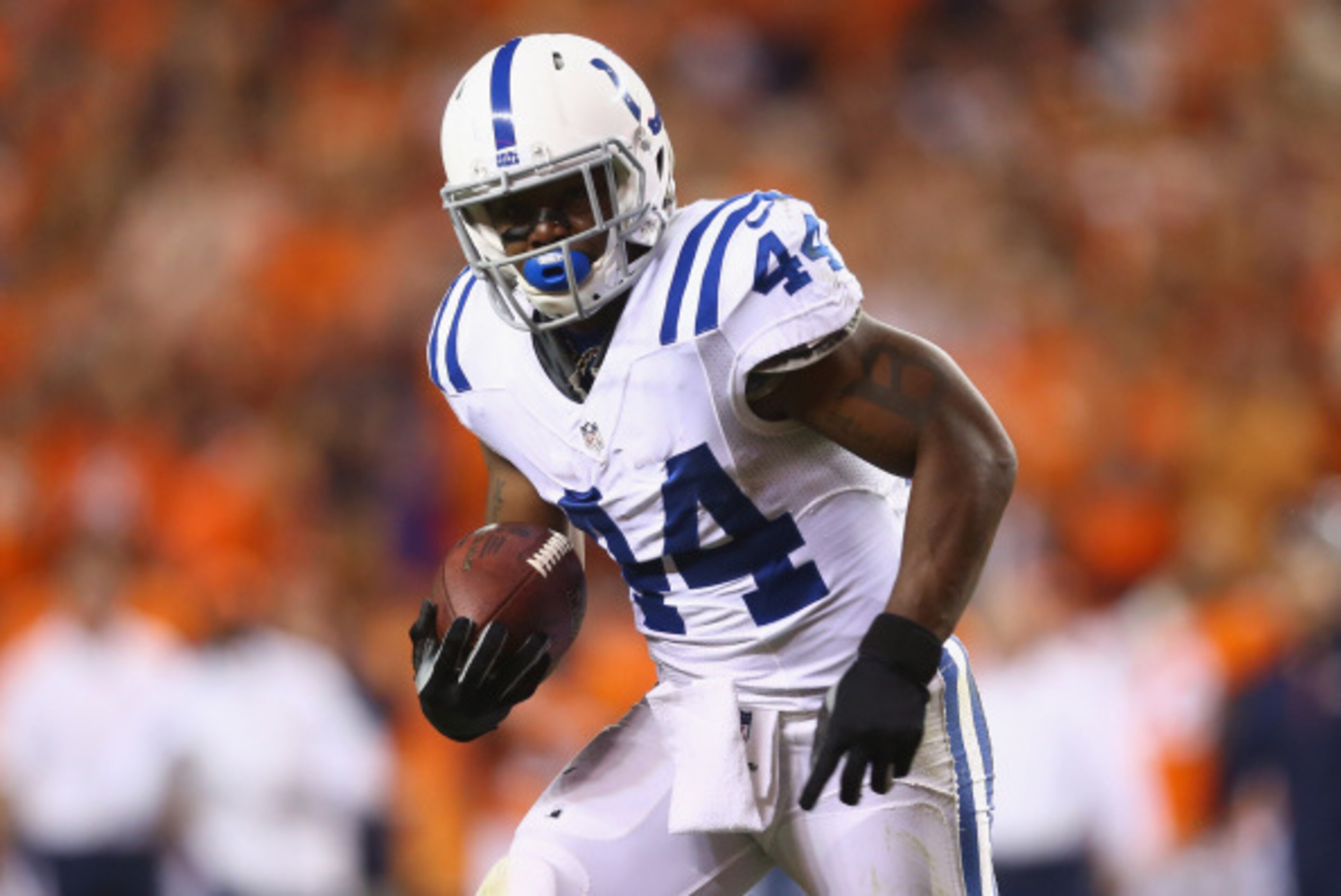 DENVER, CO - SEPTEMBER 07:  Running back Ahmad Bradshaw #44 of the Indianapolis Colts carries the ball against the Denver Broncos at Sports Authority Field at Mile High on September 7, 2014 in Denver, Colorado.  (Photo by Jeff Gross/Getty Images)