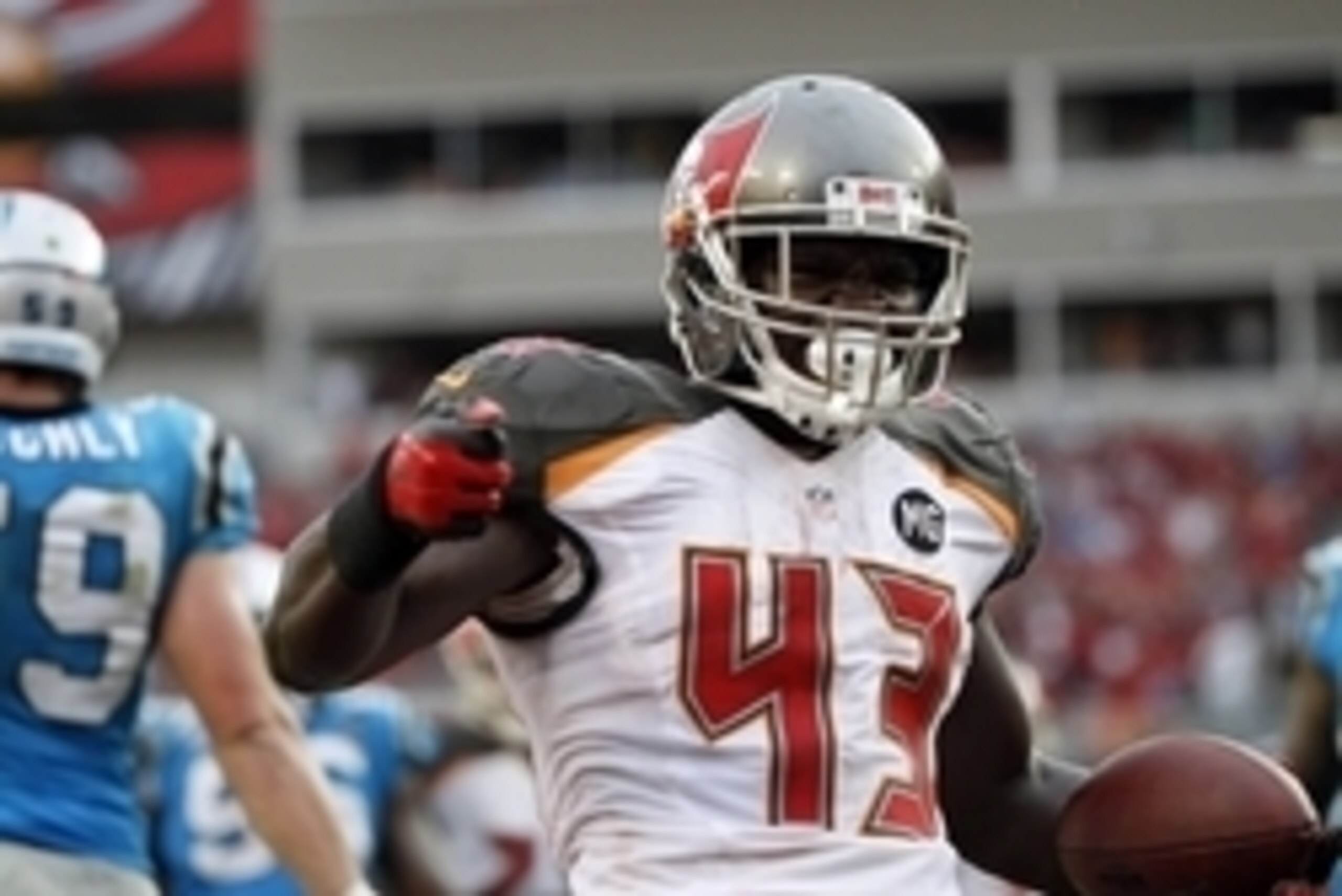 Sep 7, 2014; Tampa, FL, USA; Tampa Bay Buccaneers running back Bobby Rainey (43) reacts after he scored a touchdown against the Carolina Panthers during the second half at Raymond James Stadium. Carolina Panthers defeated the Tampa Bay Buccaneers 20-14. M