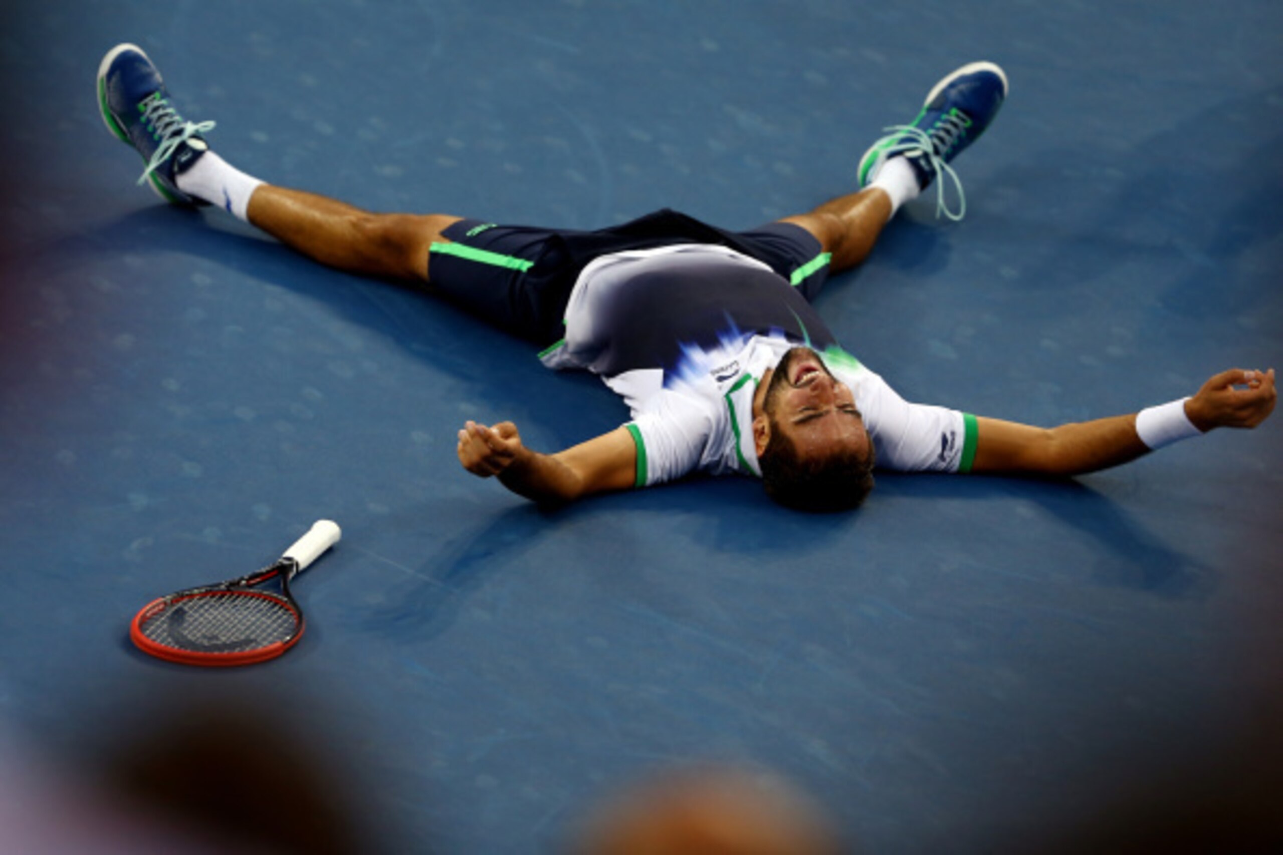 NEW YORK, NY - SEPTEMBER 08:  Marin Cilic of Croatia reacts after defeating Kei Nishikori of Japan to win the men's singles final match on Day fifteen of the 2014 US Open at the USTA Billie Jean King National Tennis Center on September 8, 2014 in the Flus