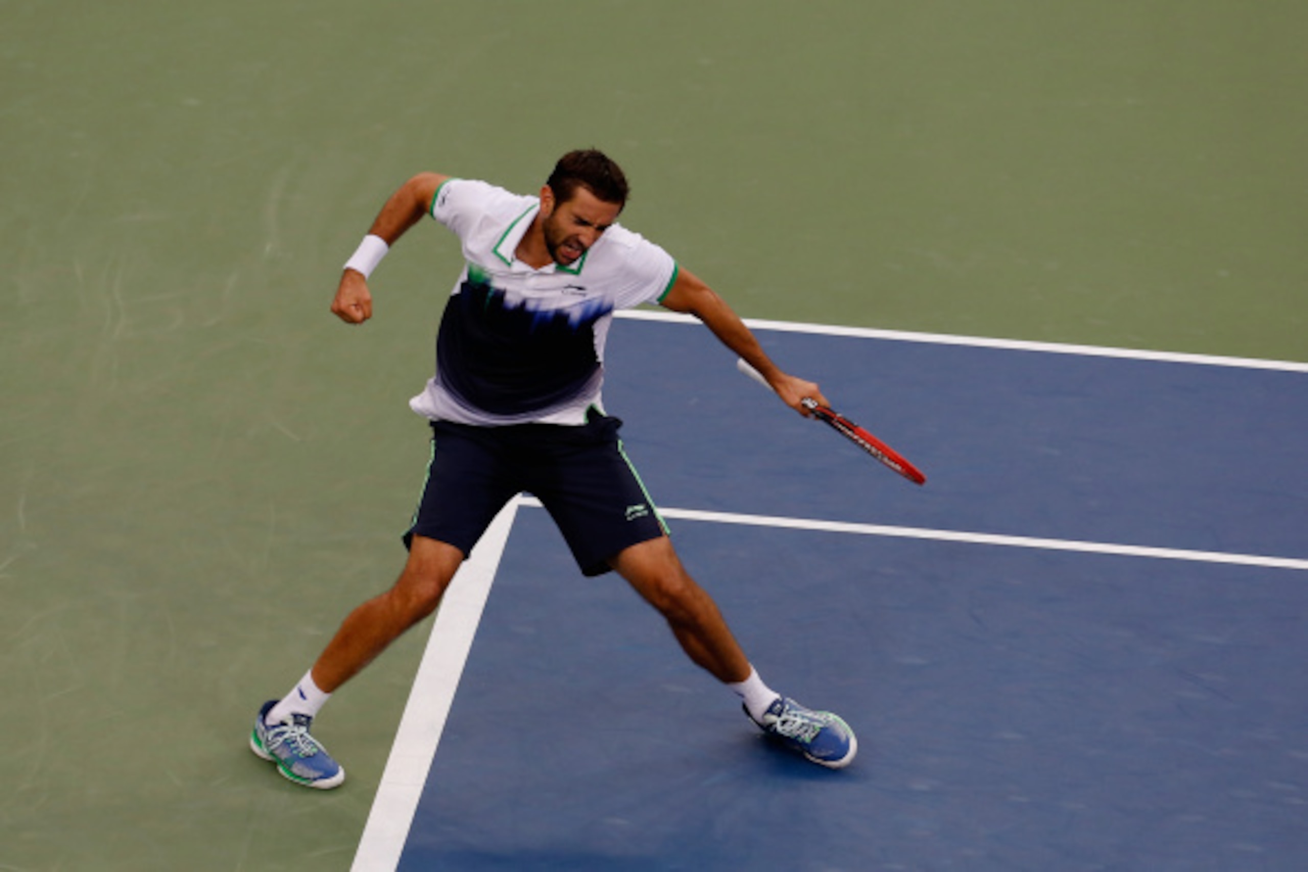 NEW YORK, NY - SEPTEMBER 08:  Marin Cilic of Croatia reacts after defeating Kei Nishikori of Japan to win the men's singles final match on Day Fifteen of the 2014 US Open at the USTA Billie Jean King National Tennis Center on September 8, 2014 in the Flus