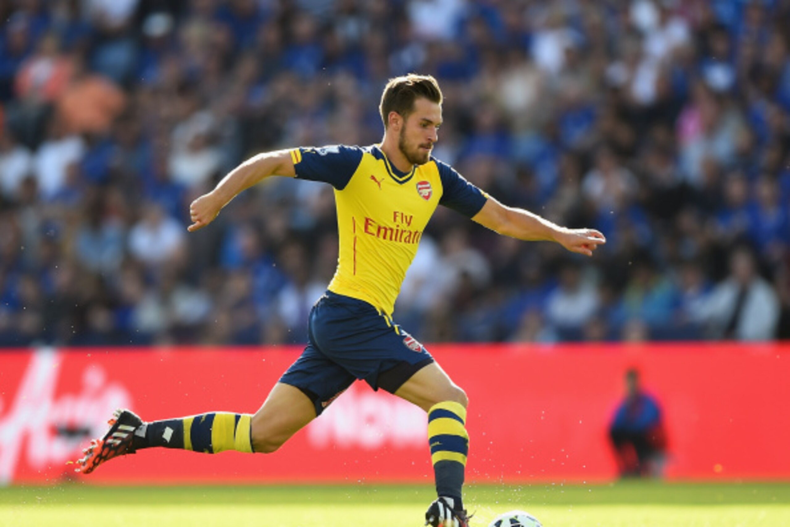 LEICESTER, ENGLAND - AUGUST 31: Aaron Ramsey of Arsenal in action during the Barclays Premier League match between Leicester City and Arsenal at The King Power Stadium on August 31, 2014 in Leicester, England. (Photo by Laurence Griffiths/Getty Images) LEICESTER, ENGLAND - AUGUST 31: Aaron Ramsey of Arsenal in action during the Barclays Premier League match between Leicester City and Arsenal at The King Power Stadium on August 31, 2014 in Leicester, England. (Photo by Laurence Griffiths/Getty Images)
