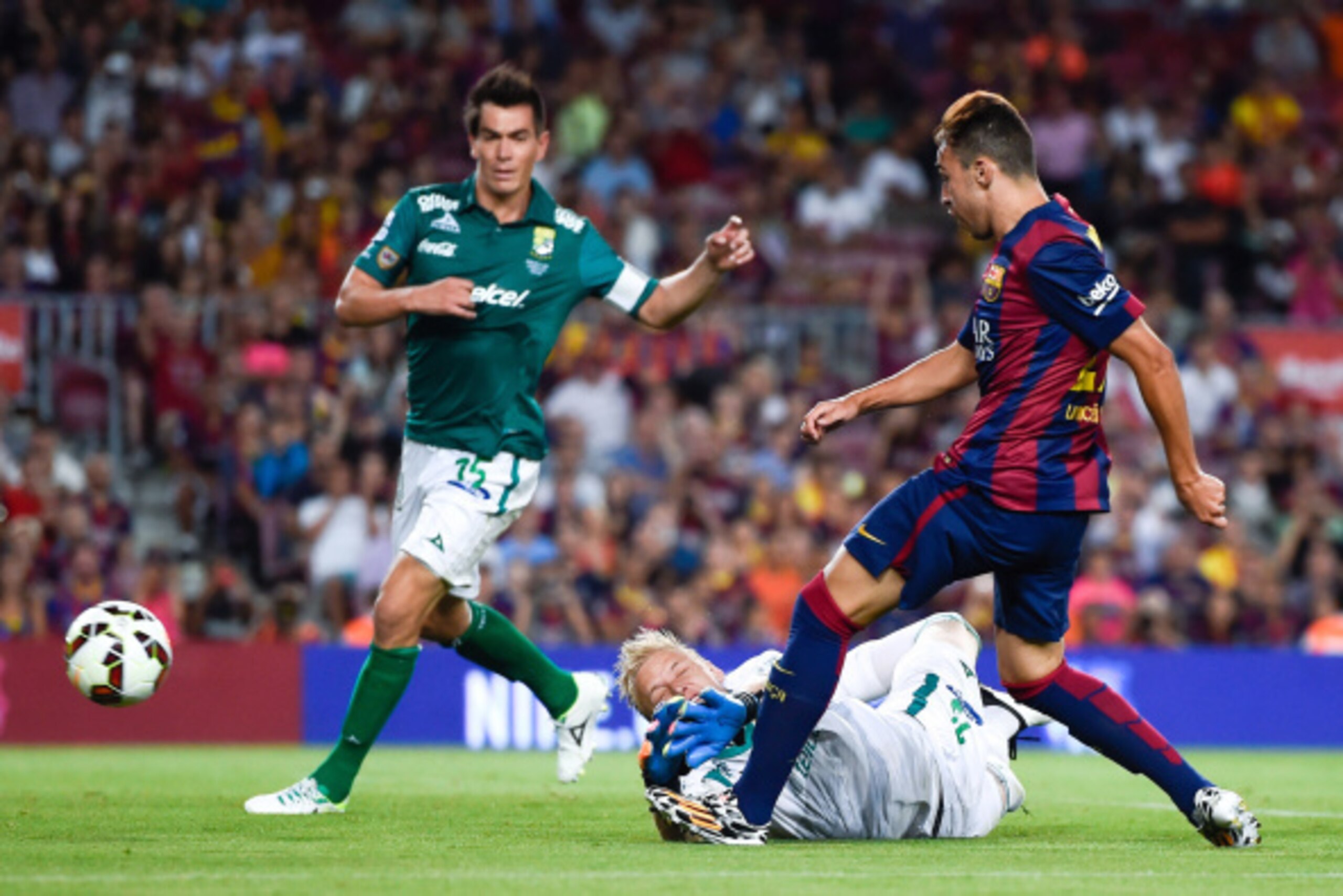 BARCELONA, SPAIN - AUGUST 18:  Munir of FC Barcelona scores his team's fourth goal during the Joan Gamper Trophy match between FC Barcelona and Club Leon at Camp Nou on August 18, 2014 in Barcelona, Spain.  (Photo by David Ramos/Getty Images)