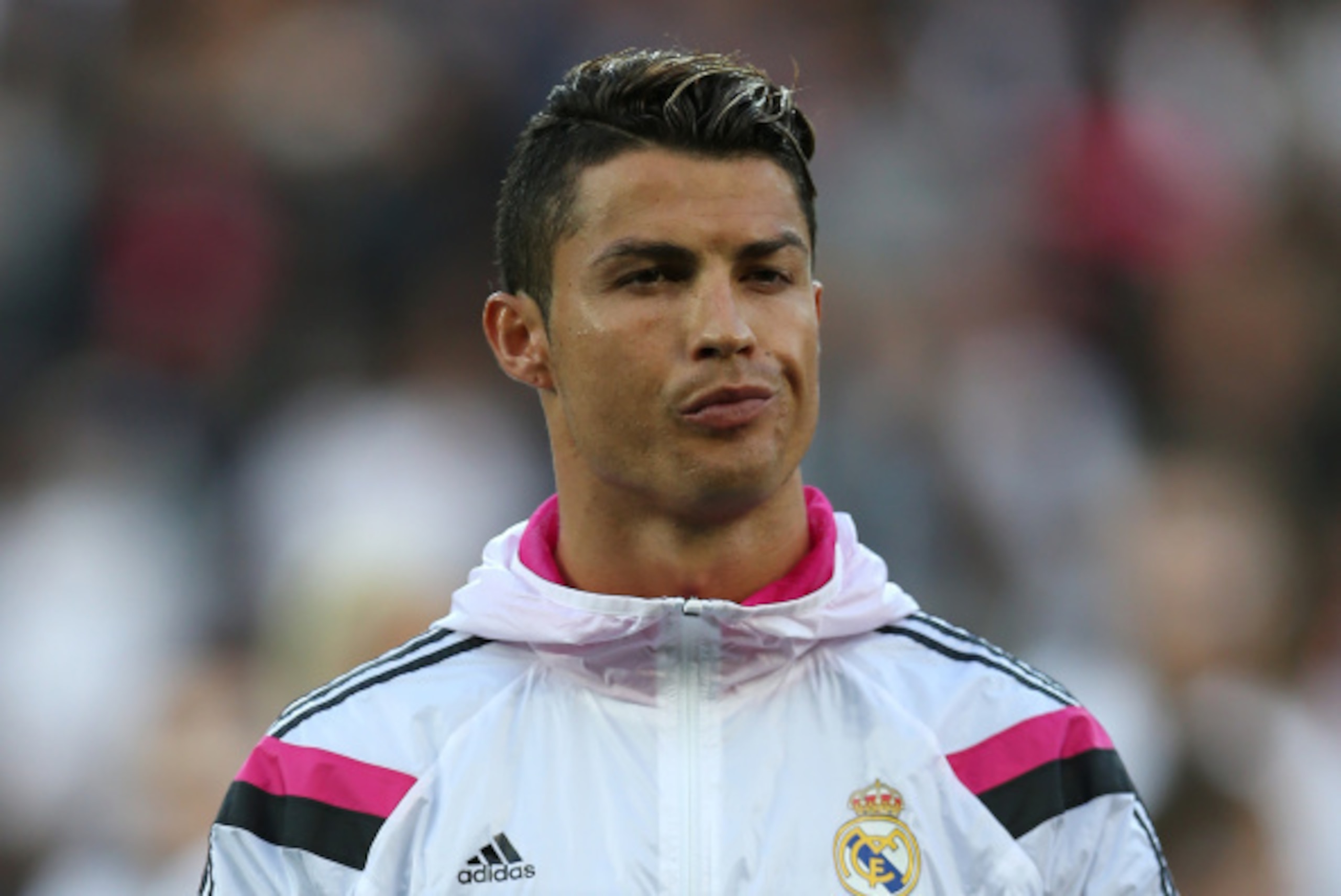 CARDIFF, WALES - AUGUST 12:  Cristiano Ronaldo of Real Madrid looks on during the UEFA Super Cup match between  Real Madrid and Sevilla at Cardiff City Stadium on August 12, 2014 Cardiff, Wales. (Photo by Ian MacNicol/Getty Images)