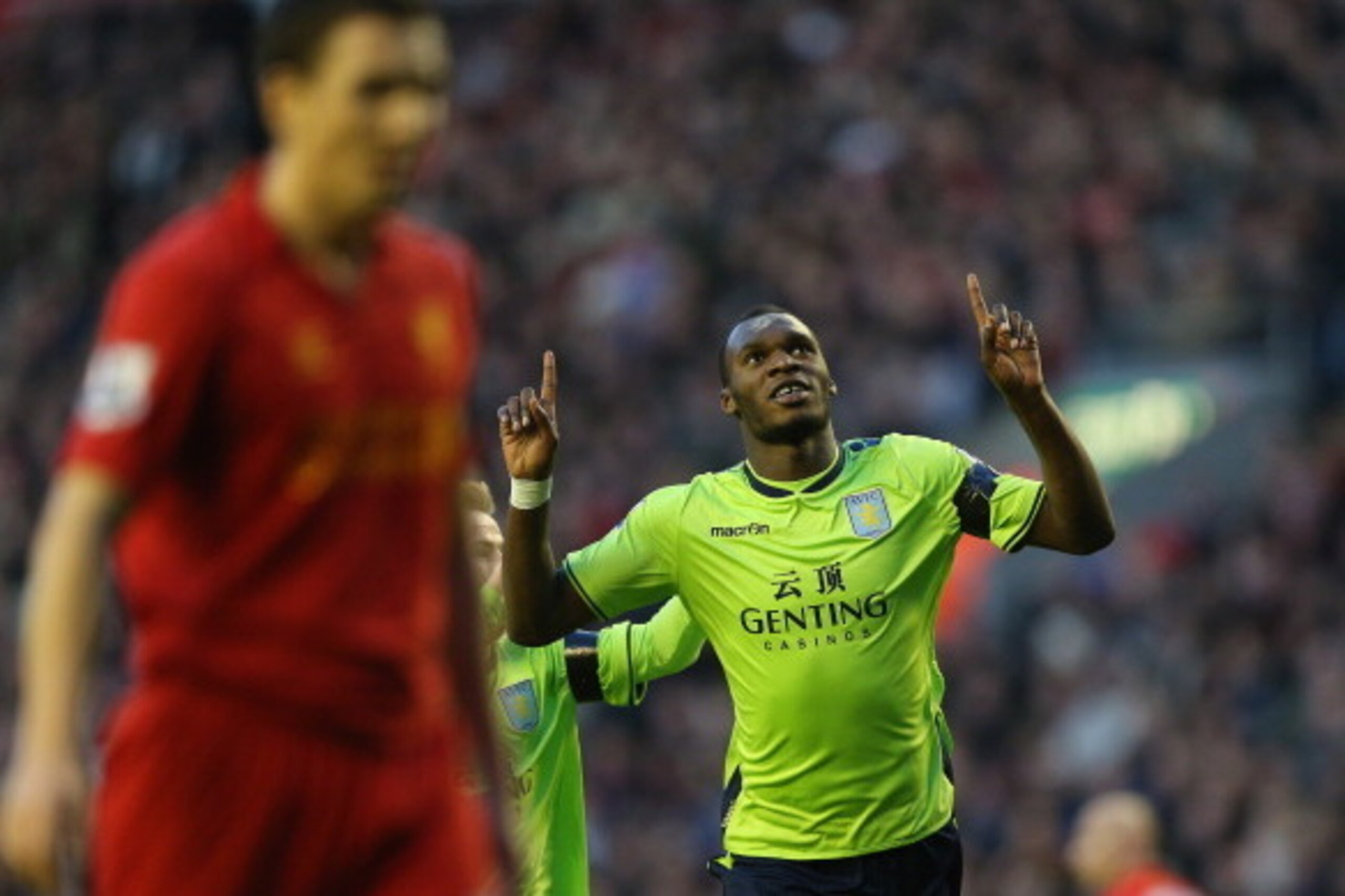 LIVERPOOL, ENGLAND - DECEMBER 15:  Christian Benteke of Aston Villa celebrates after scoring the first goal during the Barclays Premier League match between Liverpool and Aston Villa at Anfield on  December 15, 2012 in Liverpool, England.  (Photo by Clive