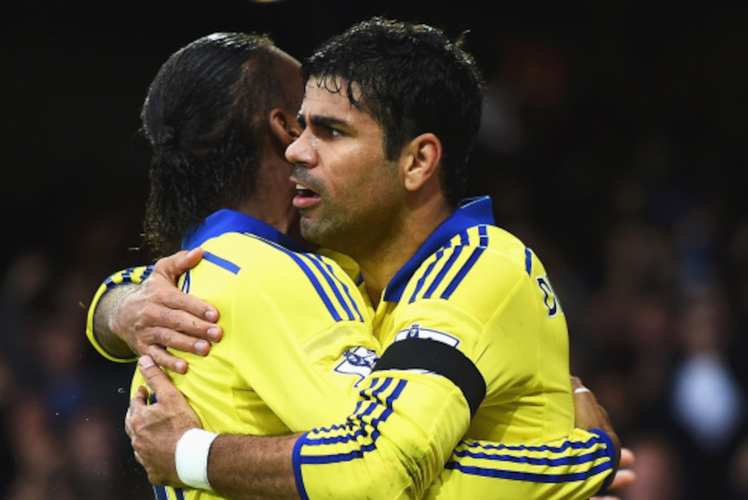 LIVERPOOL, ENGLAND - AUGUST 30:  Diego Costa of Chelsea celebrates scoring his team's sixth goal with Didier Drogba of Chelsea during the Barclays Premier League match between Everton and Chelsea at Goodison Park on August 30, 2014 in Liverpool, England. 