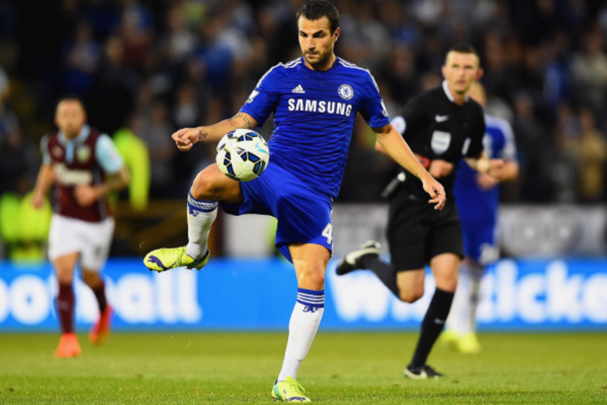 BURNLEY, ENGLAND - AUGUST 18:  Cesc Fabregas of Chelsea controls the ball during the Barclays Premier League match between Burnley and Chelsea at Turf Moor on August 18, 2014 in Burnley, England.  (Photo by Laurence Griffiths/Getty Images)