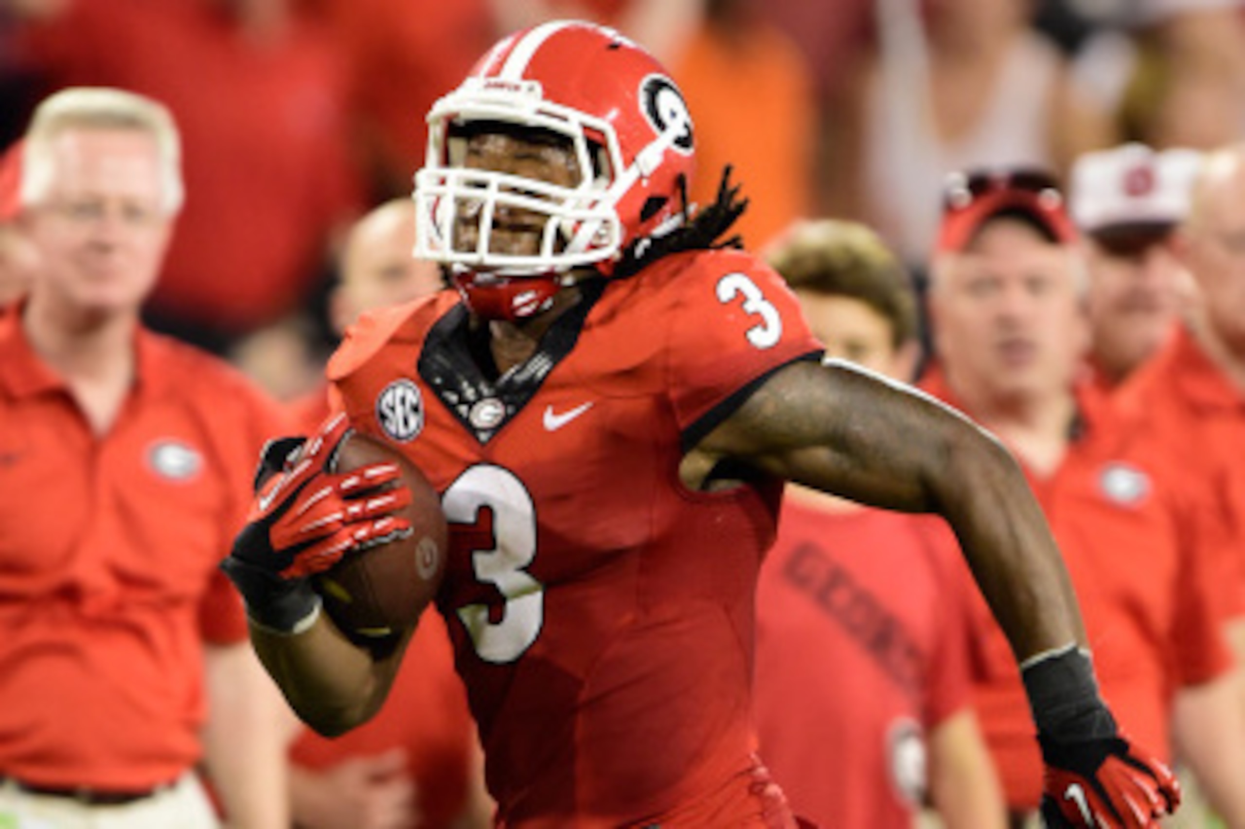 ATHENS, GA - AUGUST 30: Todd Gurley #3 of the Georgia Bulldogs carries the ball for a fourth quarter touchdown against the Clemson Tigers at Sanford Stadium on August 30, 2014 in Athens, Georgia. (Photo by Scott Cunningham/Getty Images)