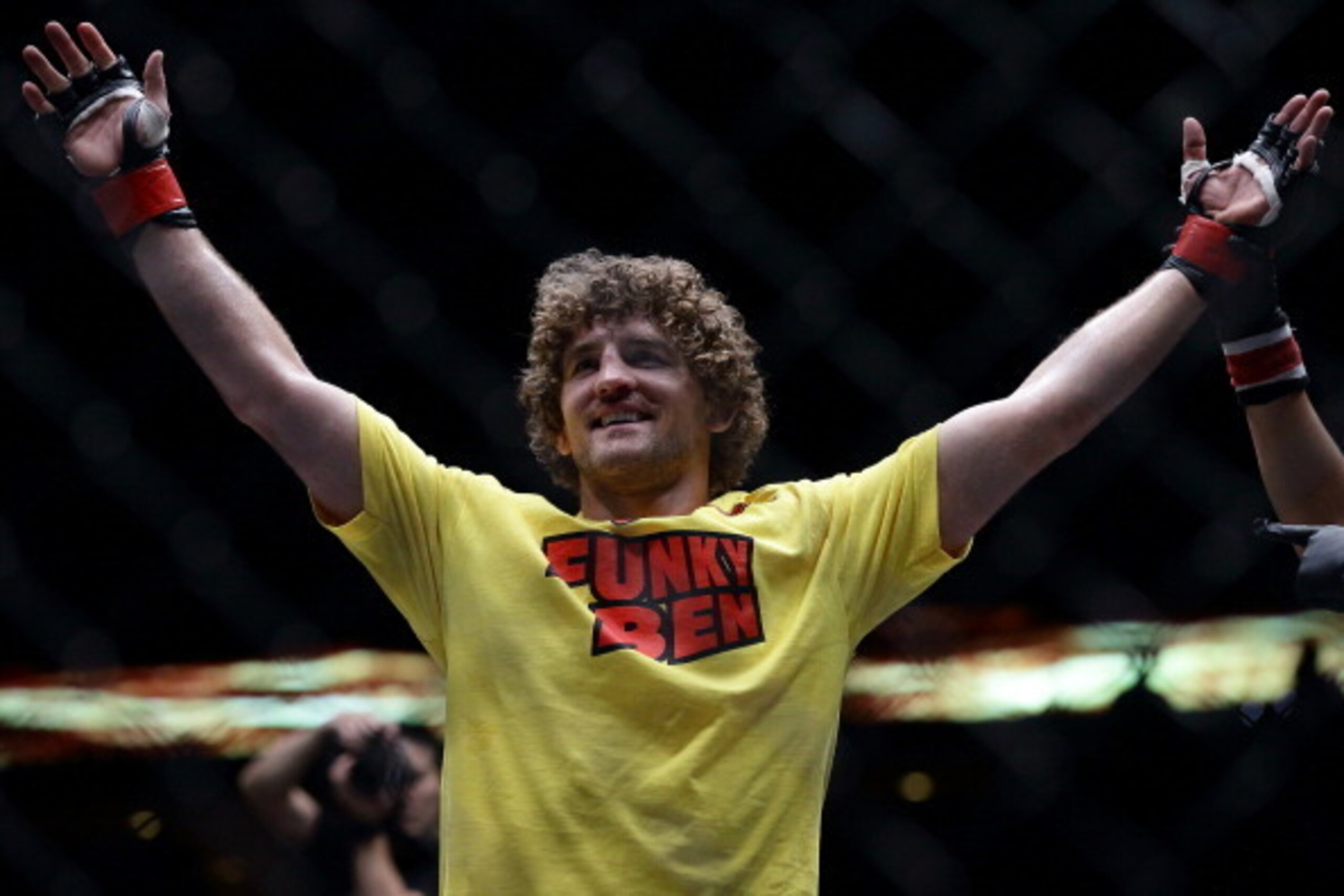 SINGAPORE - MAY 30:  Ben Askren of United States of America celebrates after defeating Bakhtiyar Abbasov of Azerbaijan during OneFC Honor & Glory at Singapore Indoor Stadium on May 30, 2014 in Singapore.  (Photo by Suhaimi Abdullah/Getty Images)
