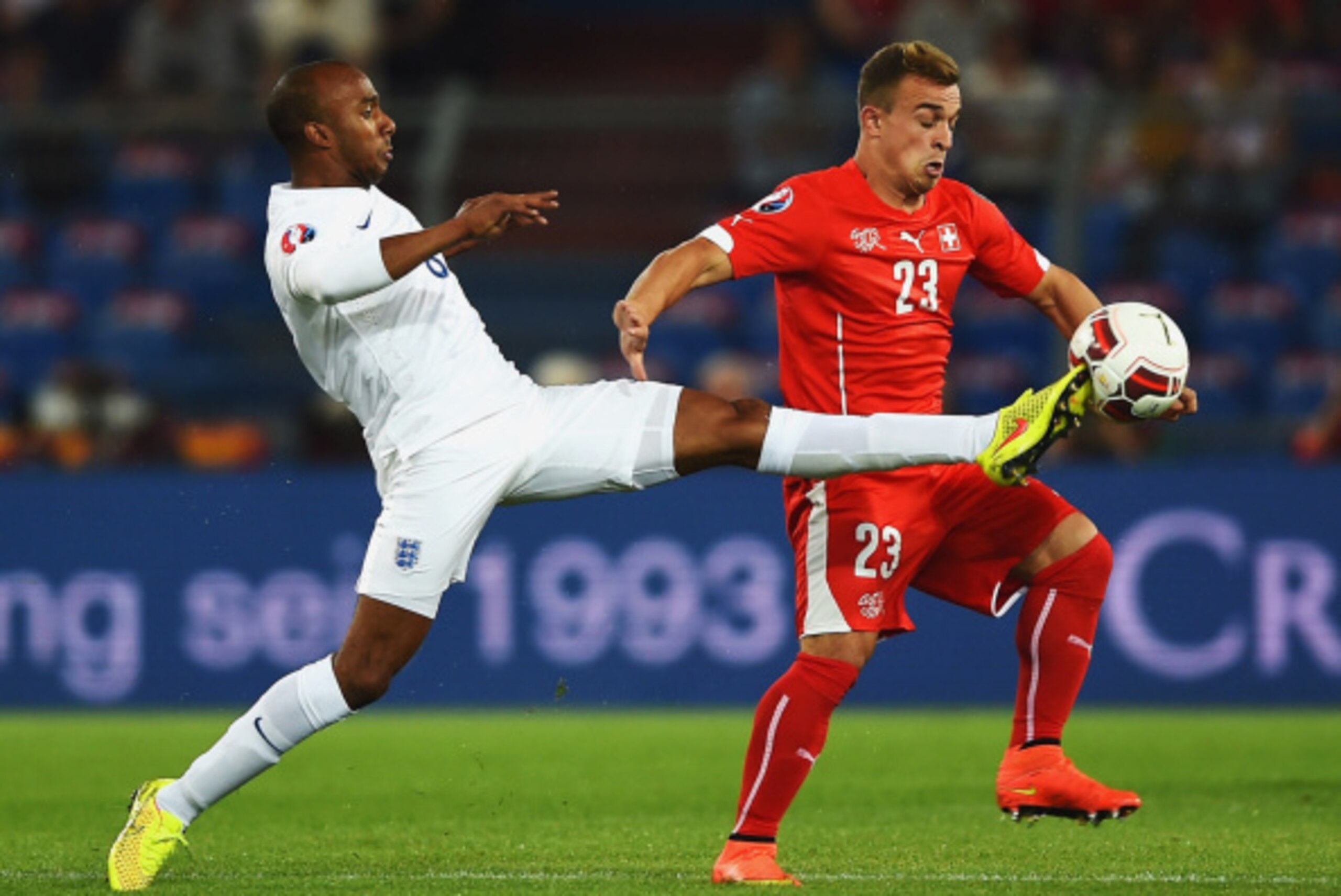 BASEL, SWITZERLAND - SEPTEMBER 08:  Fabian Delph of England challenges Xherdan Shaqiri of Switzerland during the UEFA EURO 2016 Group E qualifying match between Switzerland and England at St Jakob-Park on September 8, 2014 in Basel, Switzerland.  (Photo b