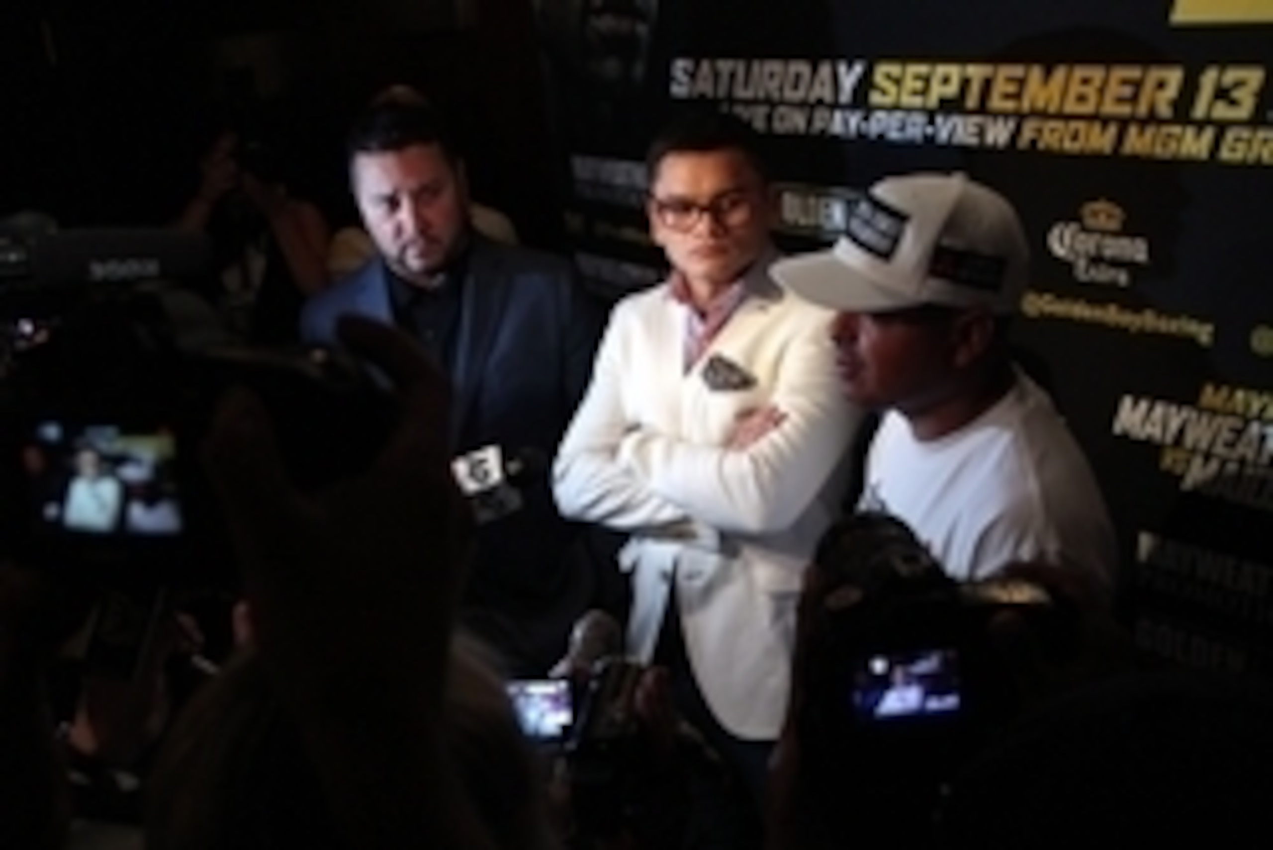 Jul 14, 2014; New York, NY, USA; Marcos Maidana (center) answers questions from media during press conference at Times Square. Mandatory Credit: Noah K. Murray-USA TODAY Sports Jul 14, 2014; New York, NY, USA; Marcos Maidana (center) answers questions from media during press conference at Times Square. Mandatory Credit: Noah K. Murray-USA TODAY Sports