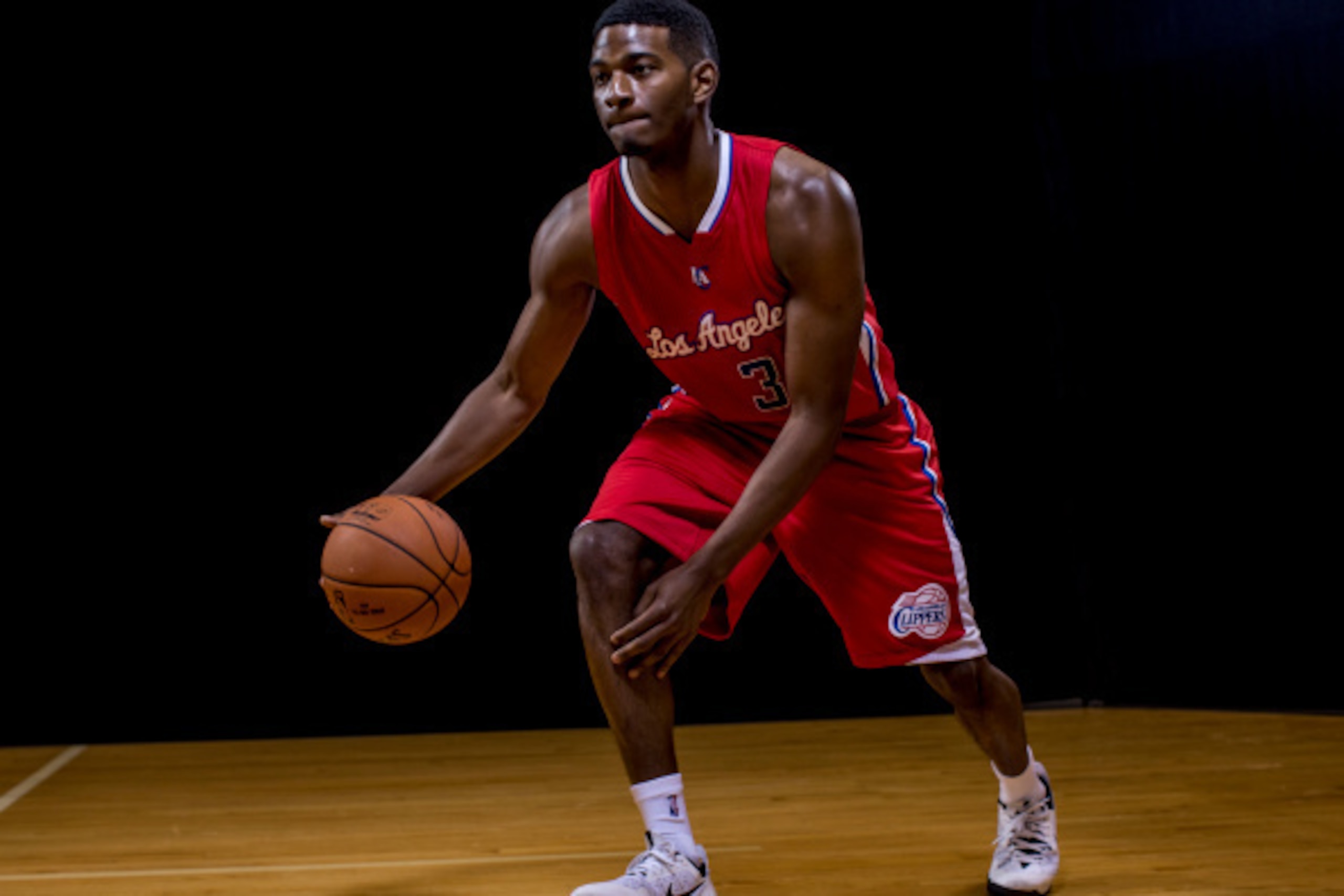 TARRYTOWN, NY - AUGUST 03: C.J. Wilcox #30 of the Los Angeles Clippers poses for a portrait during the 2014 NBA rookie photo shoot at MSG Training Center on August 3, 2014 in Tarrytown, New York. NOTE TO USER: User expressly acknowledges and agrees that, 