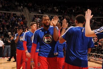 AUBURN HILLS, MI - JANUARY 20:  Greg Monroe #10 of the Detroit Pistons gets introduced before the game against the Los Angeles Clippers on January 20, 2014 at The Palace of Auburn Hills in Auburn Hills, Michigan. NOTE TO USER: User expressly acknowledges 