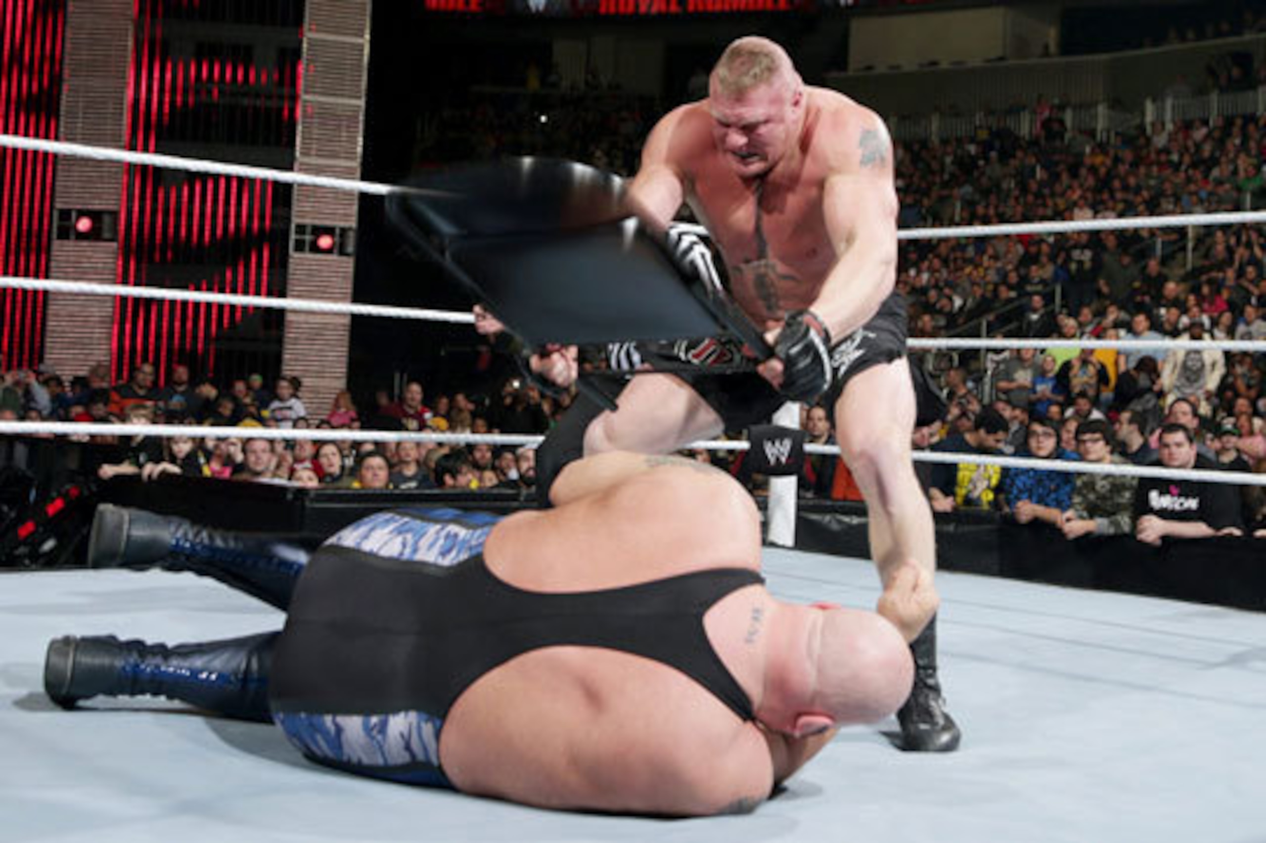 Brock Lesnar attacks Big Show at the Royal Rumble. Brock Lesnar attacks Big Show at the Royal Rumble.