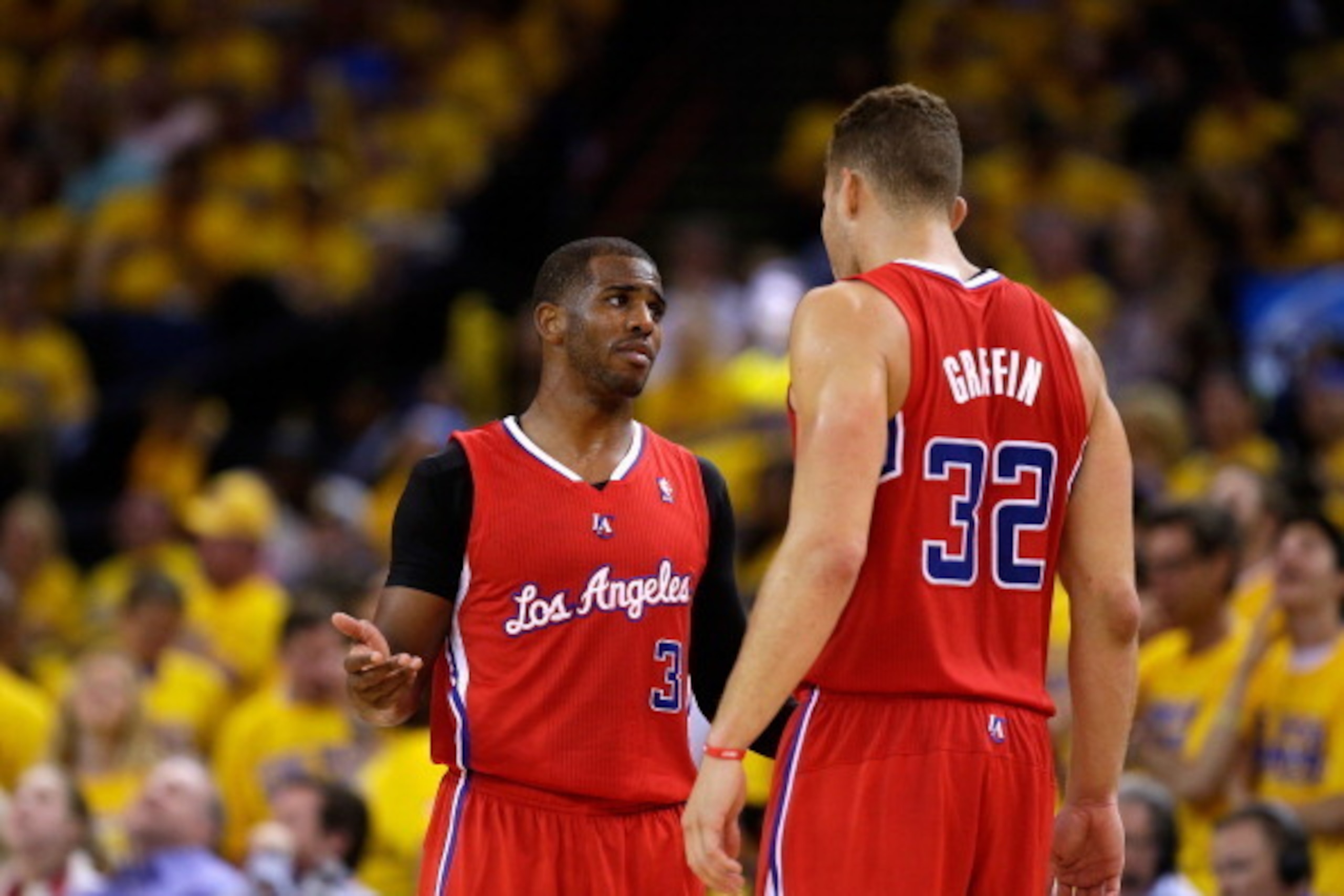 OAKLAND, CA - MAY 01:  Blake Griffin #32 talks to Chris Paul #3 of the Los Angeles Clippers during their game against the Golden State Warriors in Game Six of the Western Conference Quarterfinals during the 2014 NBA Playoffs at ORACLE Arena on May 1, 2014