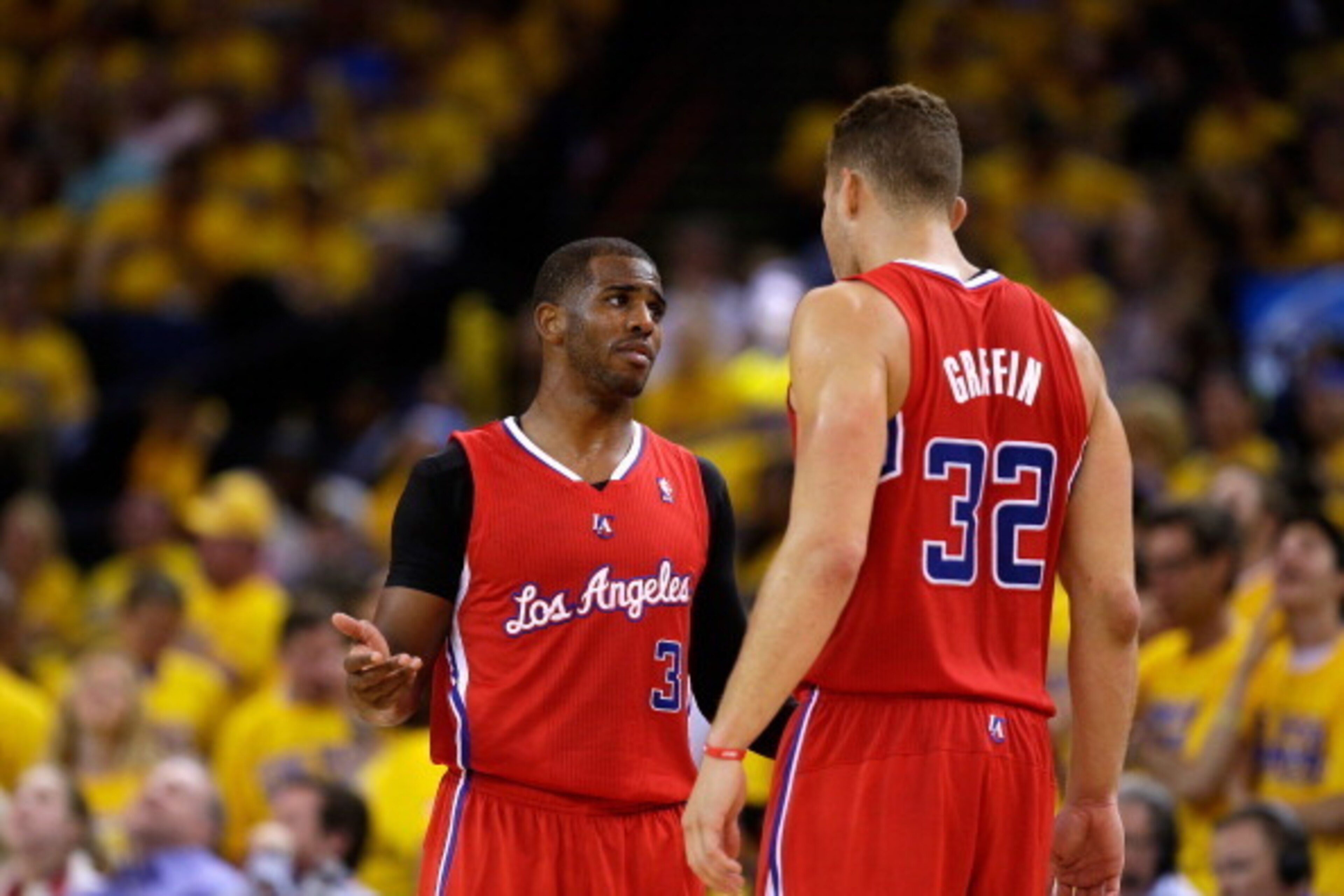 OAKLAND, CA - MAY 01:  Blake Griffin #32 talks to Chris Paul #3 of the Los Angeles Clippers during their game against the Golden State Warriors in Game Six of the Western Conference Quarterfinals during the 2014 NBA Playoffs at ORACLE Arena on May 1, 2014