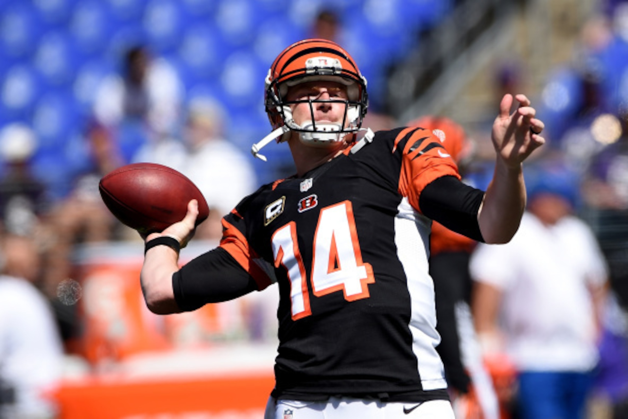BALTIMORE, MD - SEPTEMBER 07: Quarterback Andy Dalton #14 of the Cincinnati Bengals warms up before a game against the Baltimore Ravens at M&T Bank Stadium on September 7, 2014 in Baltimore, Maryland.  (Photo by Patrick Smith/Getty Images)