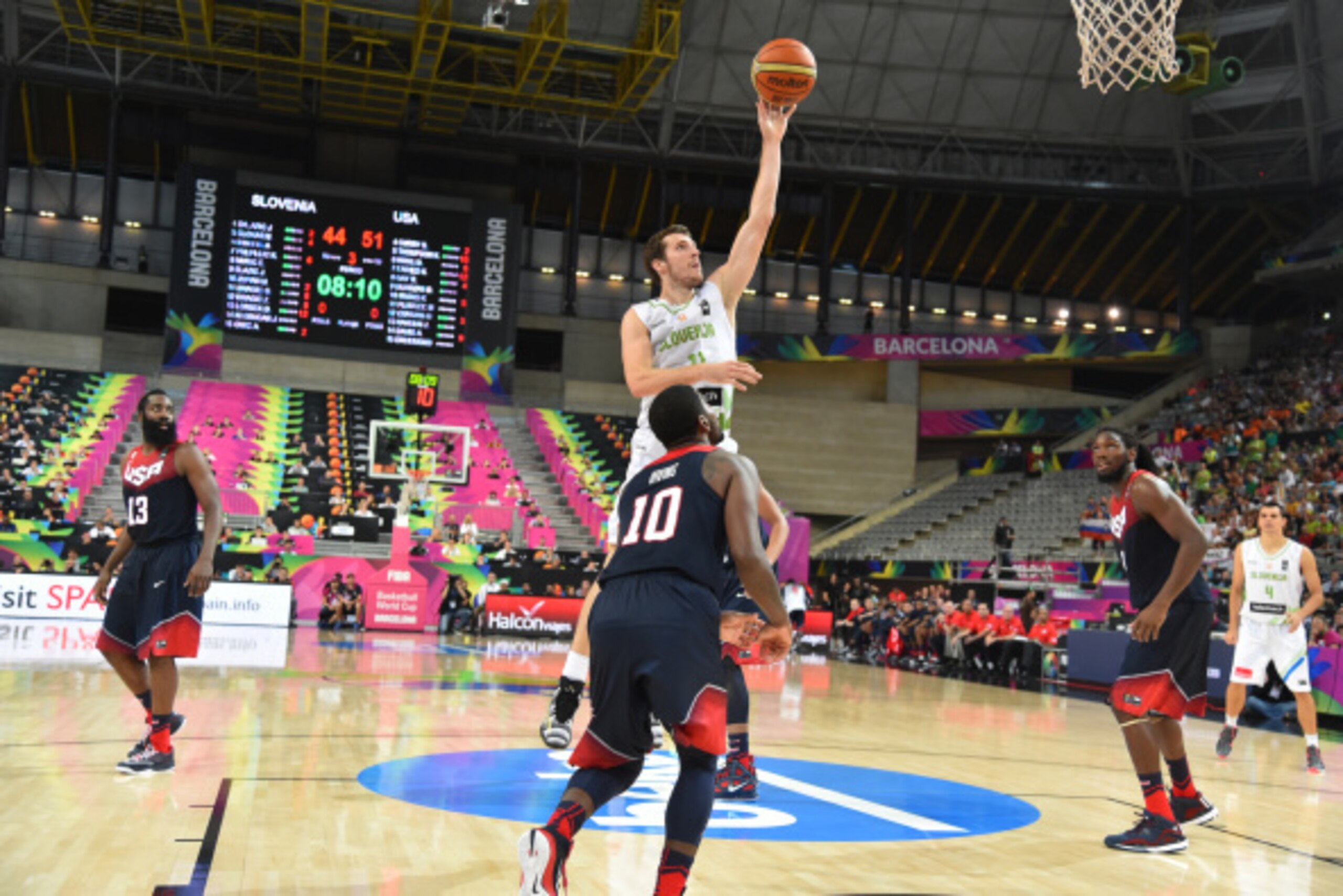 BARCELONA, SPAIN - SEPTEMBER 9:  Goran Dragic #11 of the Slovenia National Team shoots against Kyrie Irving #10 of the USA Basketball Men's National Team during the 2014 FIBA World Cup quarter-finals at Palau Sant Jordi on September 9, 2014 in Barcelona, 