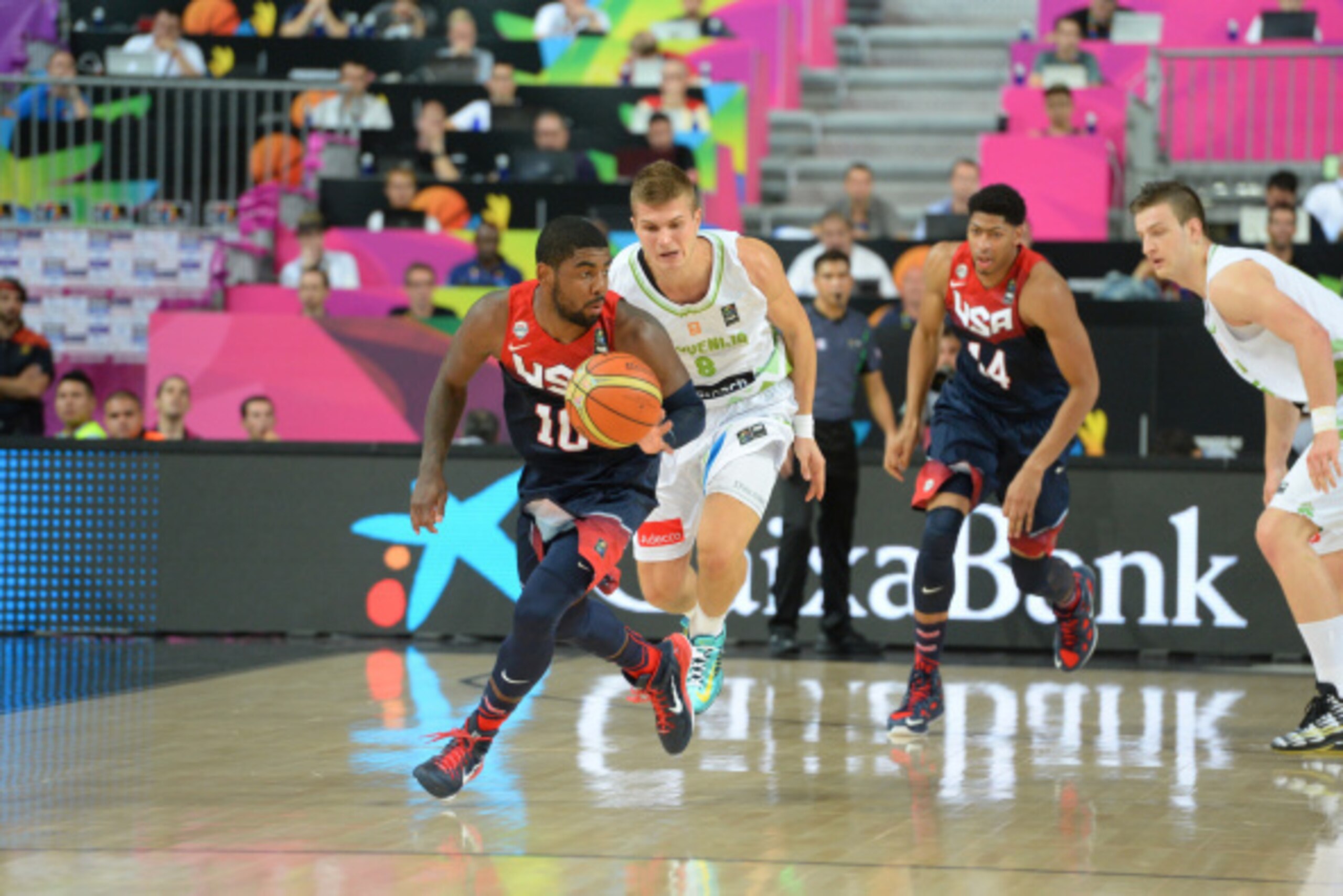 BARCELONA, SPAIN - SEPTEMBER 9: Kyrie Irving #10 of the USA Basketball Men's National Team drives against the Slovenia National Team during the 2014 FIBA World Cup quarter-finals at Palau Sant Jordi on September 9, 2014 in Barcelona, Spain. NOTE TO USER: BARCELONA, SPAIN - SEPTEMBER 9: Kyrie Irving #10 of the USA Basketball Men's National Team drives against the Slovenia National Team during the 2014 FIBA World Cup quarter-finals at Palau Sant Jordi on September 9, 2014 in Barcelona, Spain. NOTE TO USER: